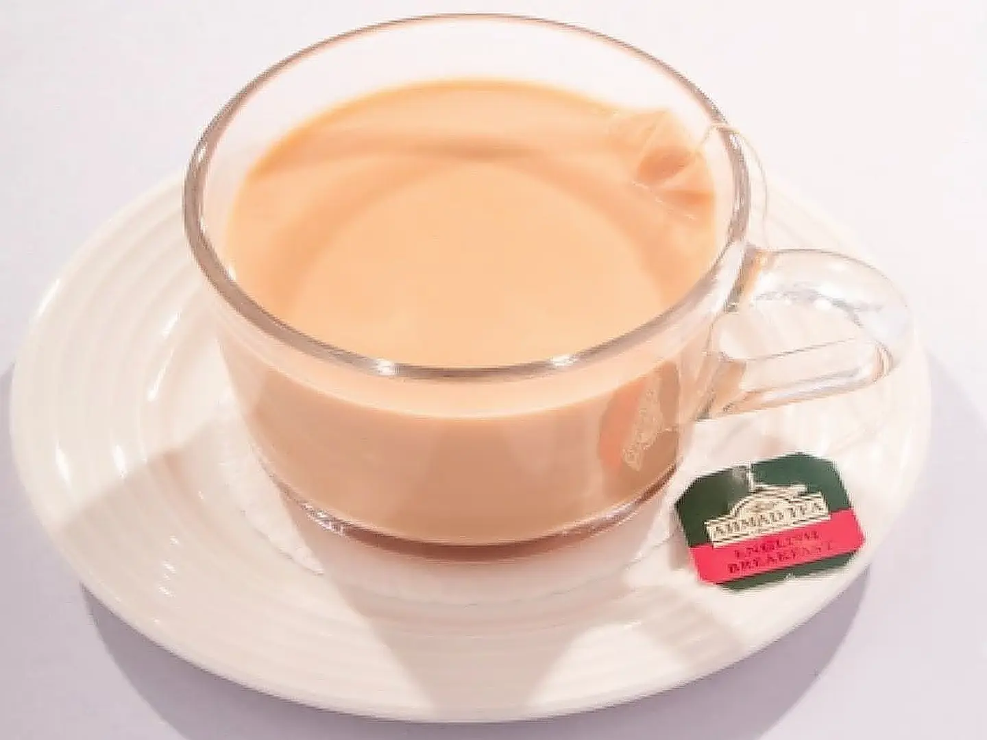 Red Tea Cup With Milk