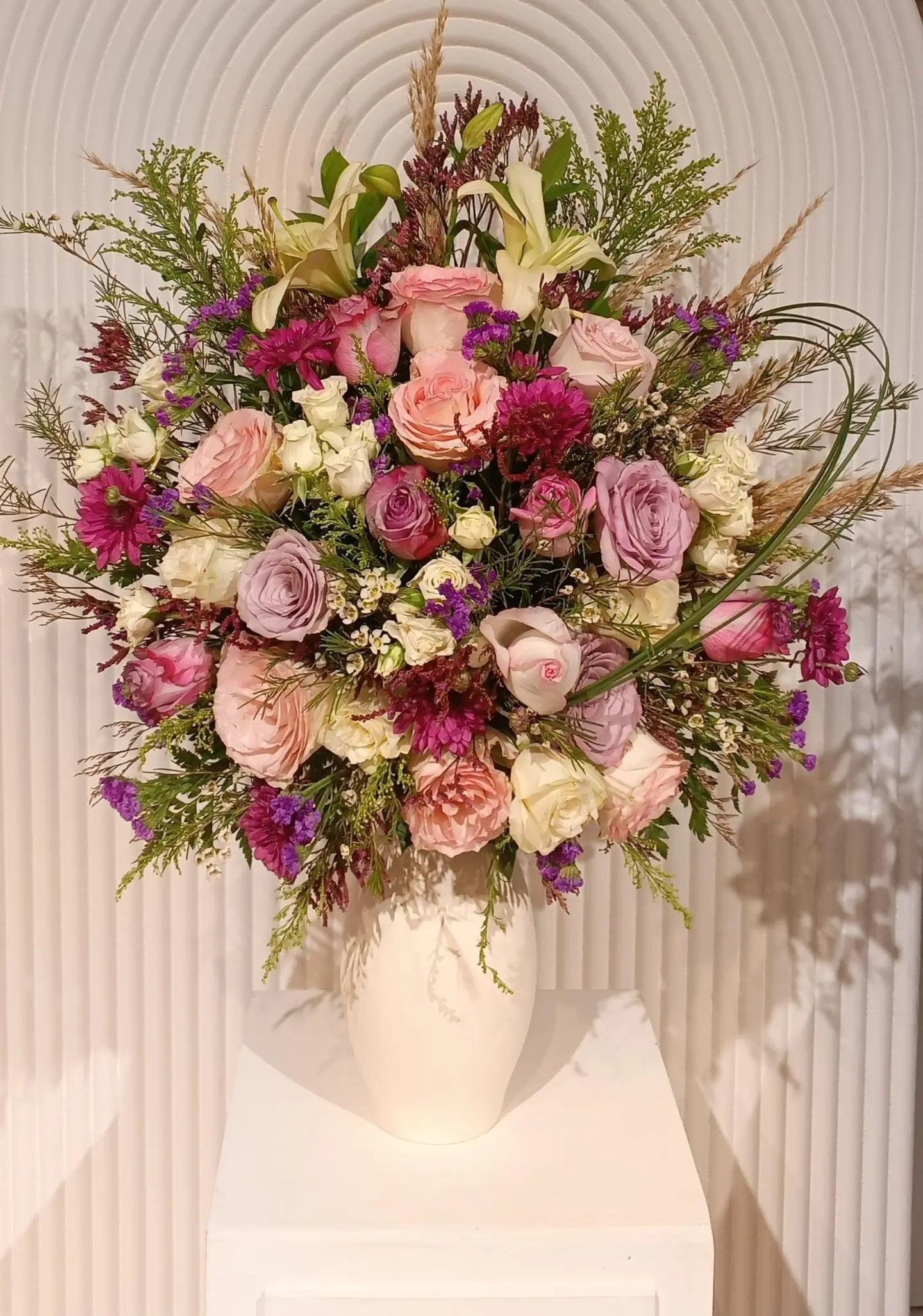 Arrangement With High Ceramic Vase