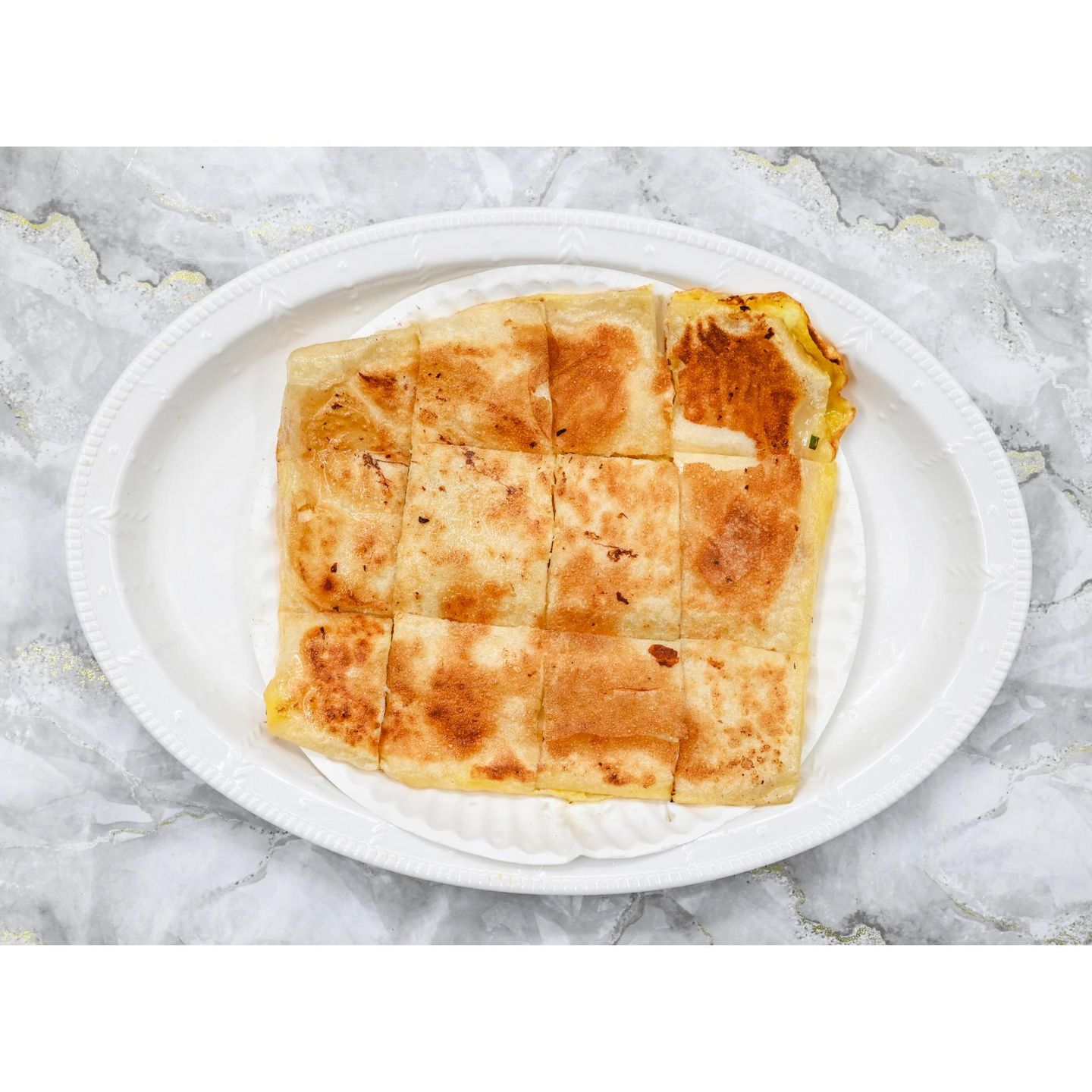 مطبق بالجبنة السائلة