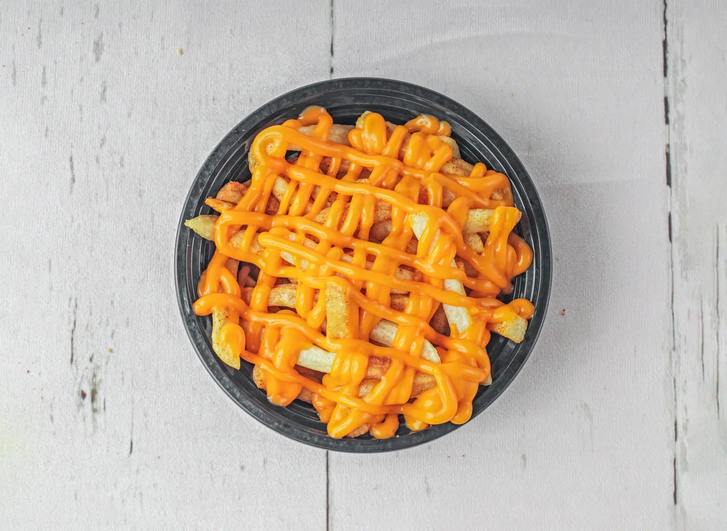 Small Plate Of Fries With Cheese