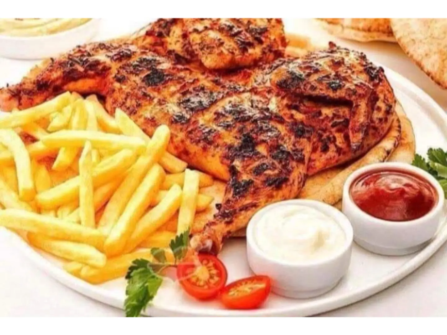 دجاج على الفحم مع بطاطس