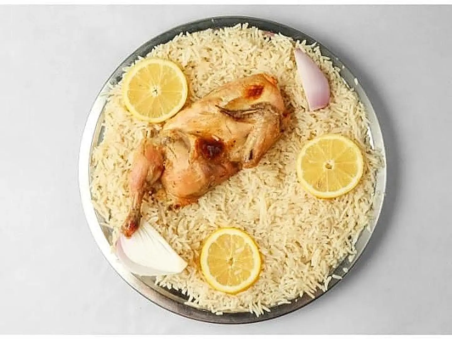 نصف دجاج حنيذ