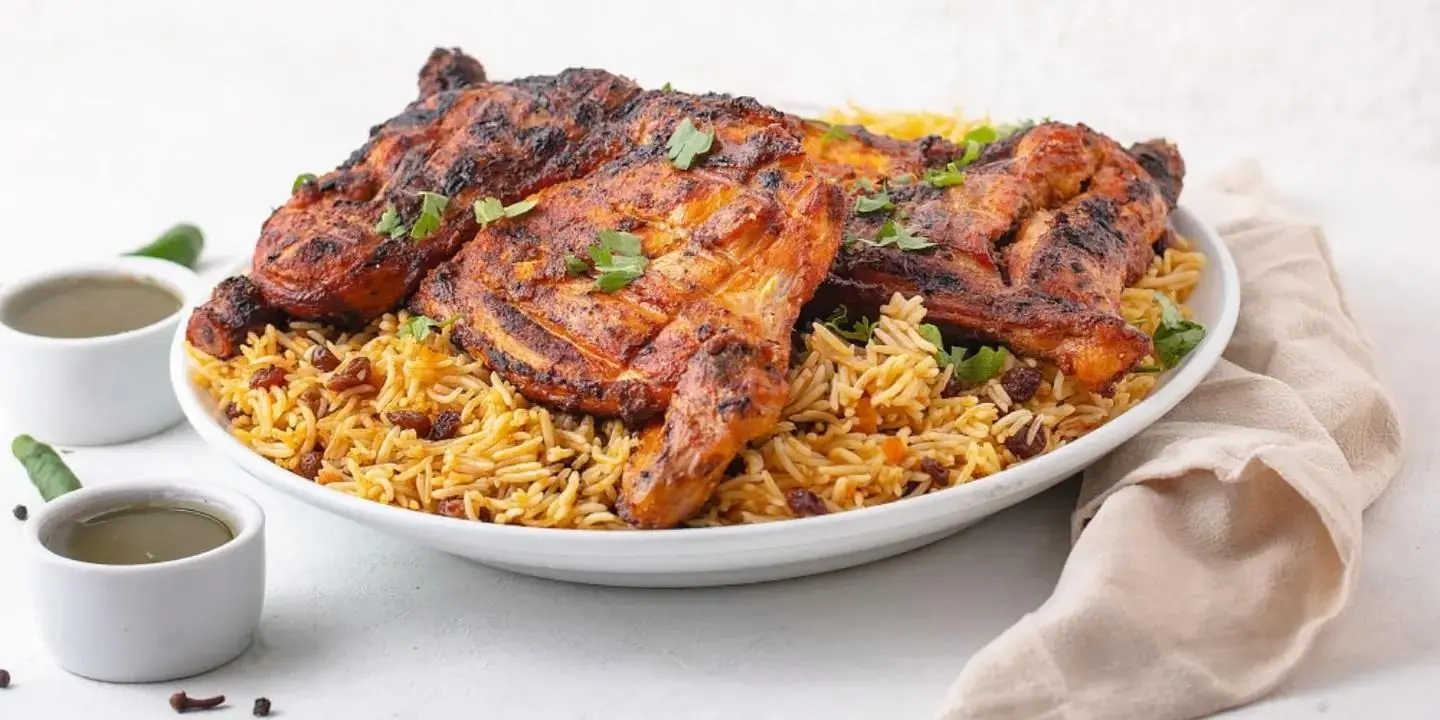 Half A Charcoaled Chicken With Rice