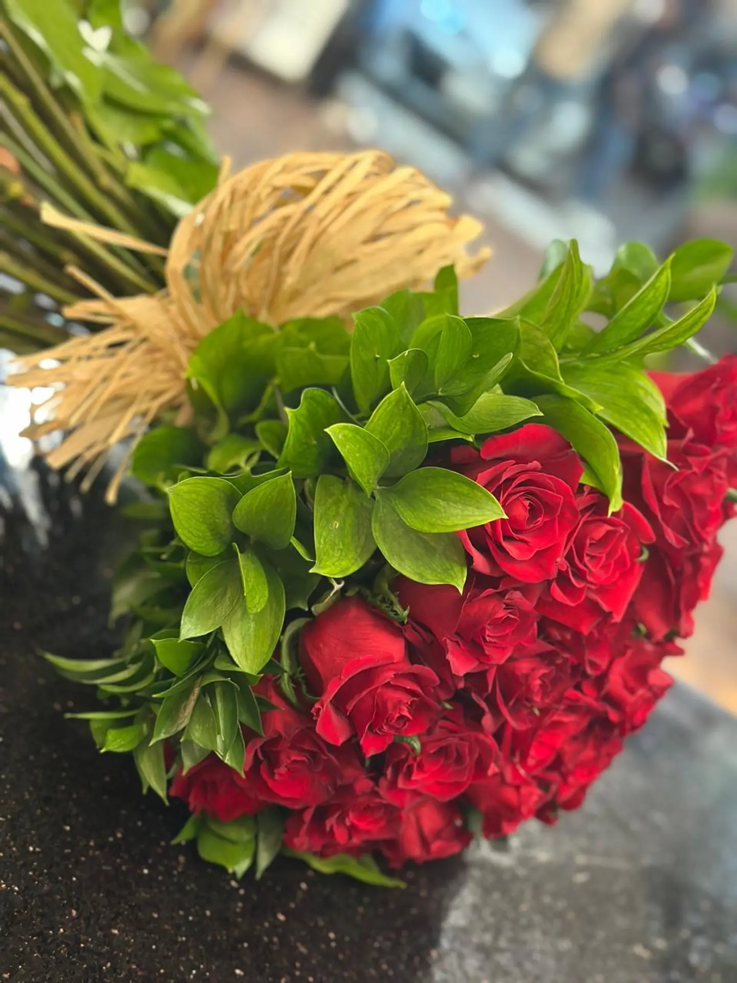 A Beautiful Red Roses Bouquet Flowers With Rucses