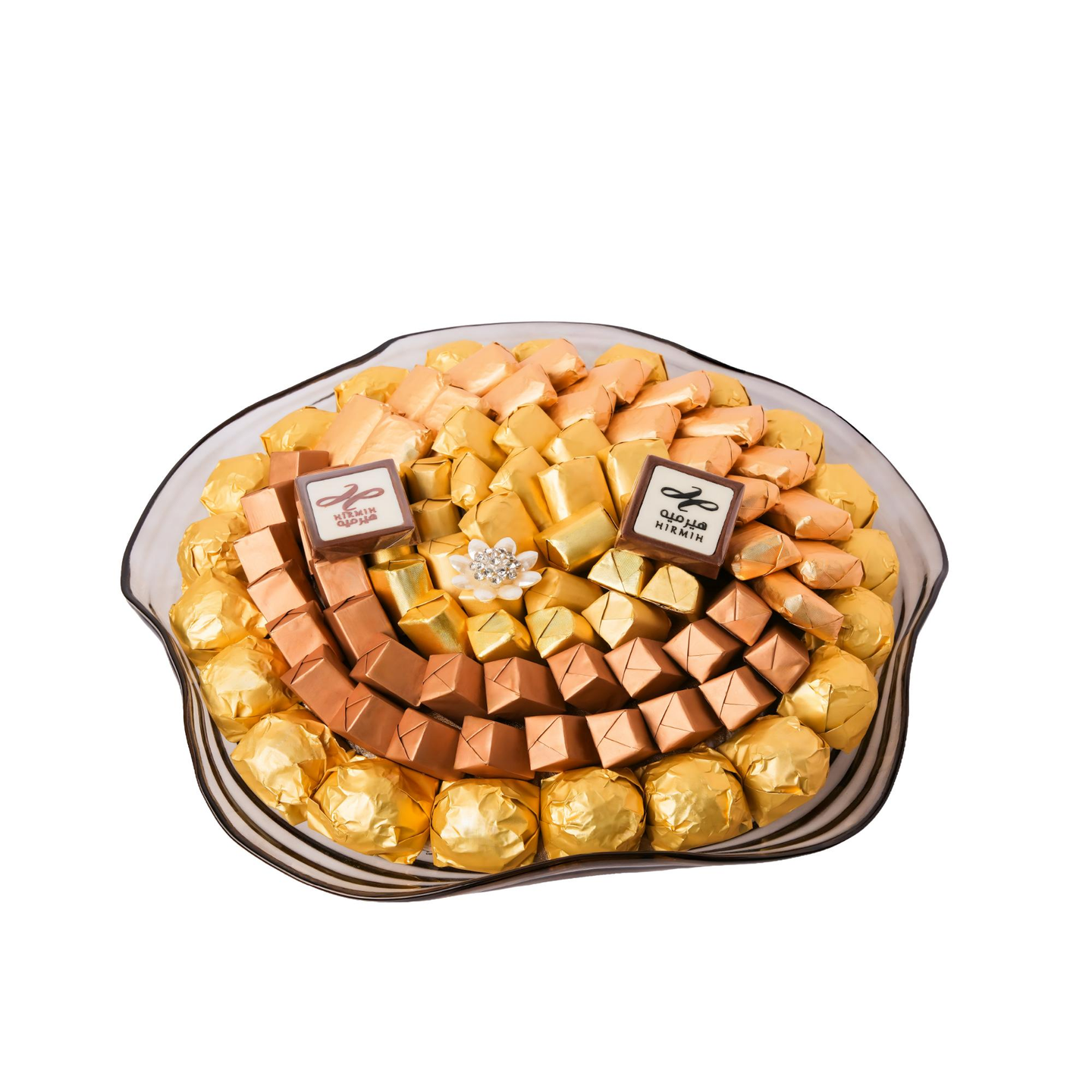 A Tray Of Chocolates Wrapped In The Shape Of A Luxurious Rose