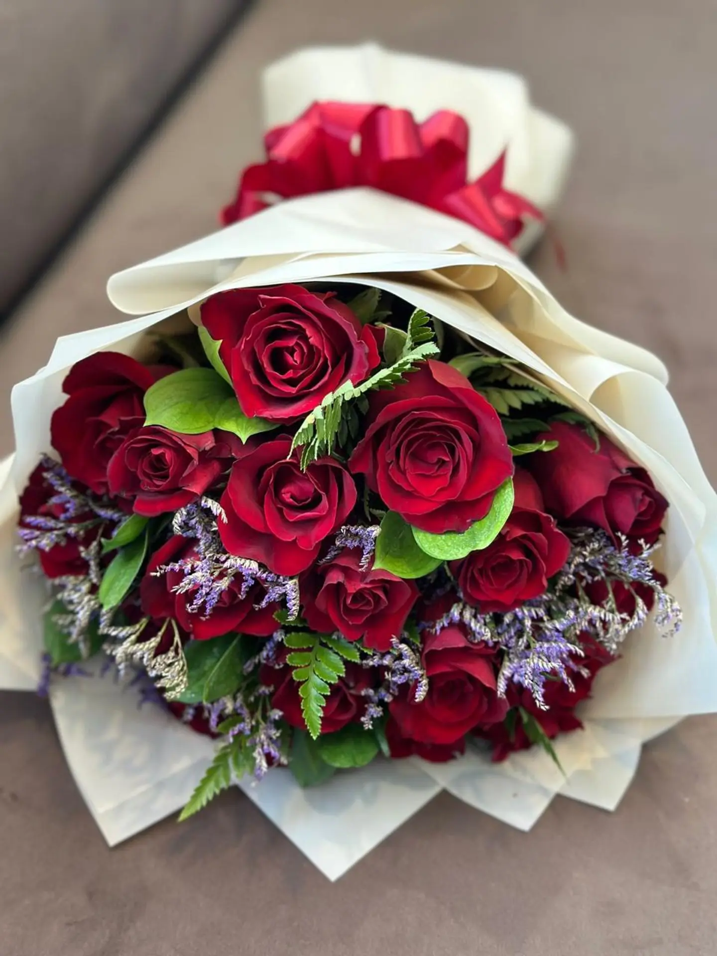 A Lovely Red Roses Bouquet With Almnum Purple