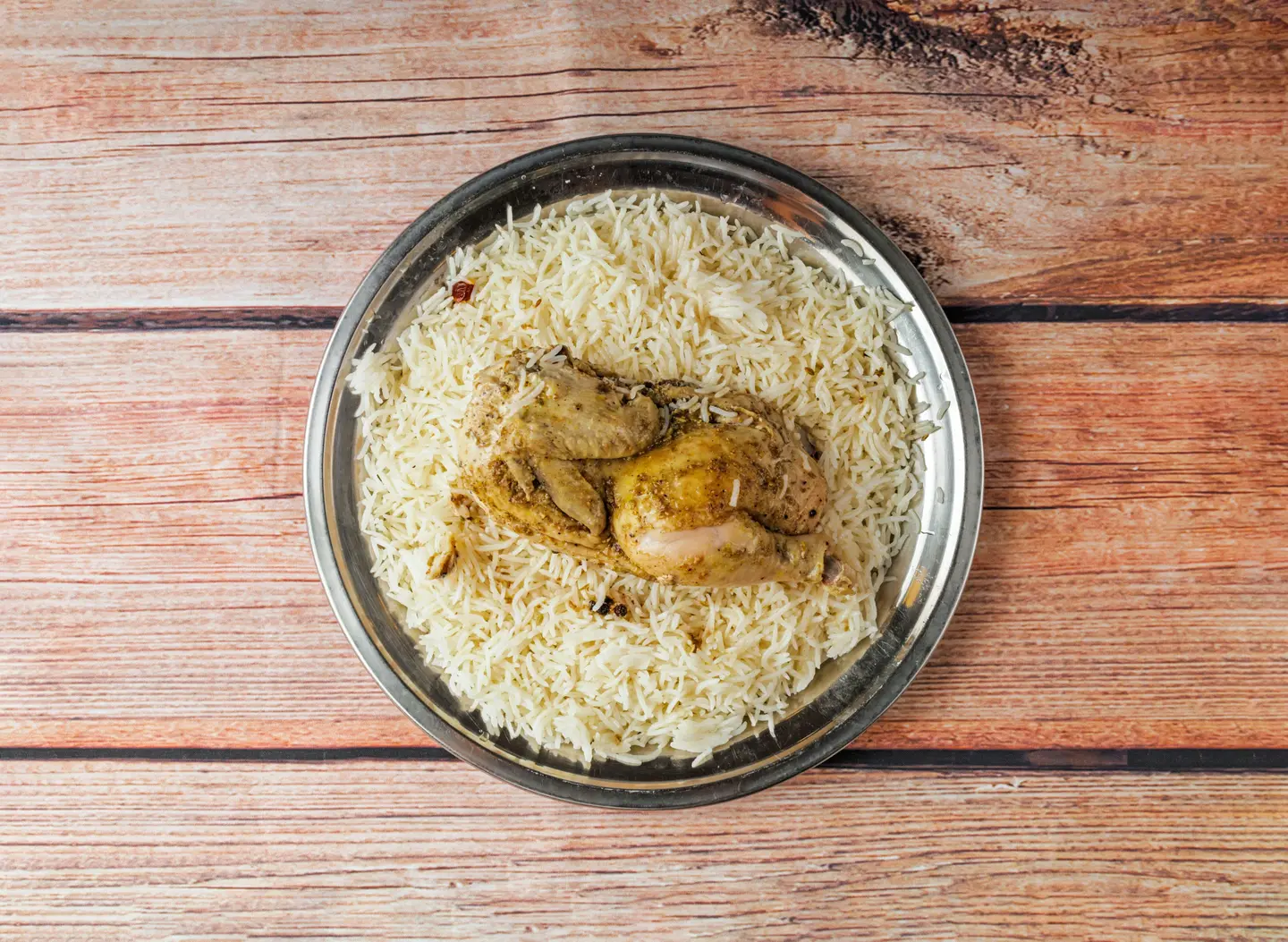 نصف دجاجة حنيذ مع الأرز