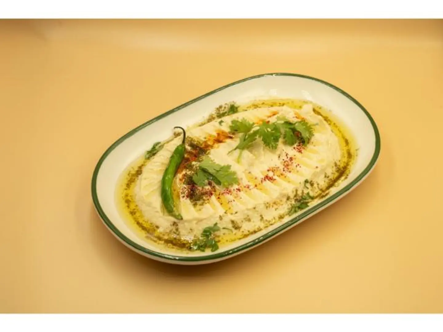 حمص كولياندرو بزيت الزيتون