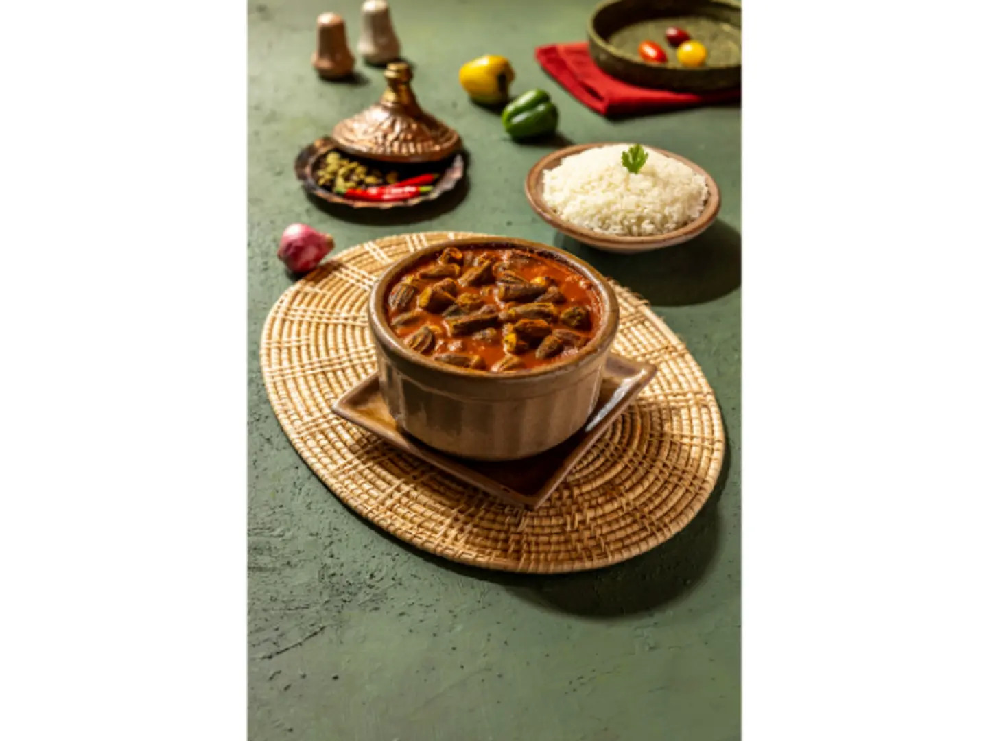 Okra & Lamb Chunk Tajin Served With Your Choice Of Rice