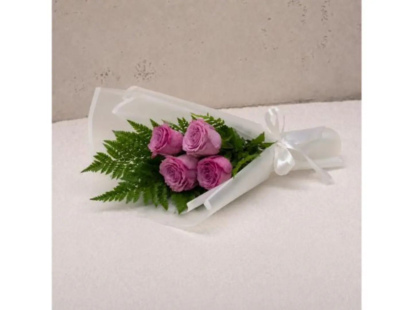 Purple Flowers Buoquet And White Wrapping