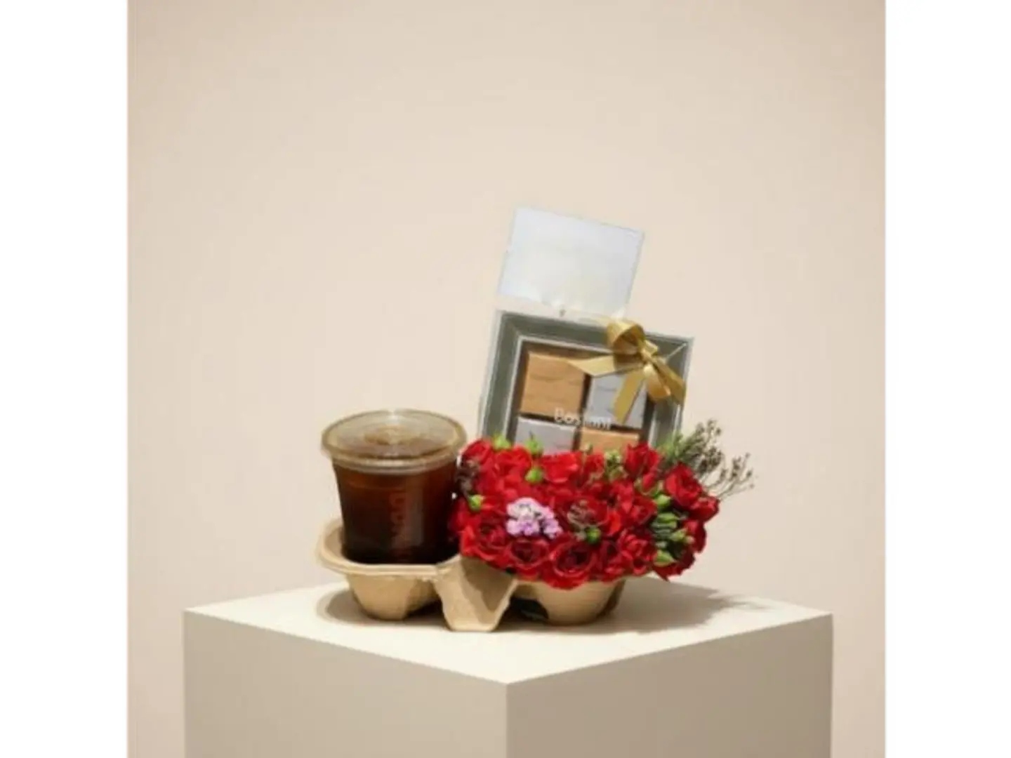 Arrangement Of Flowers And Coffee With Bustani Chocolate