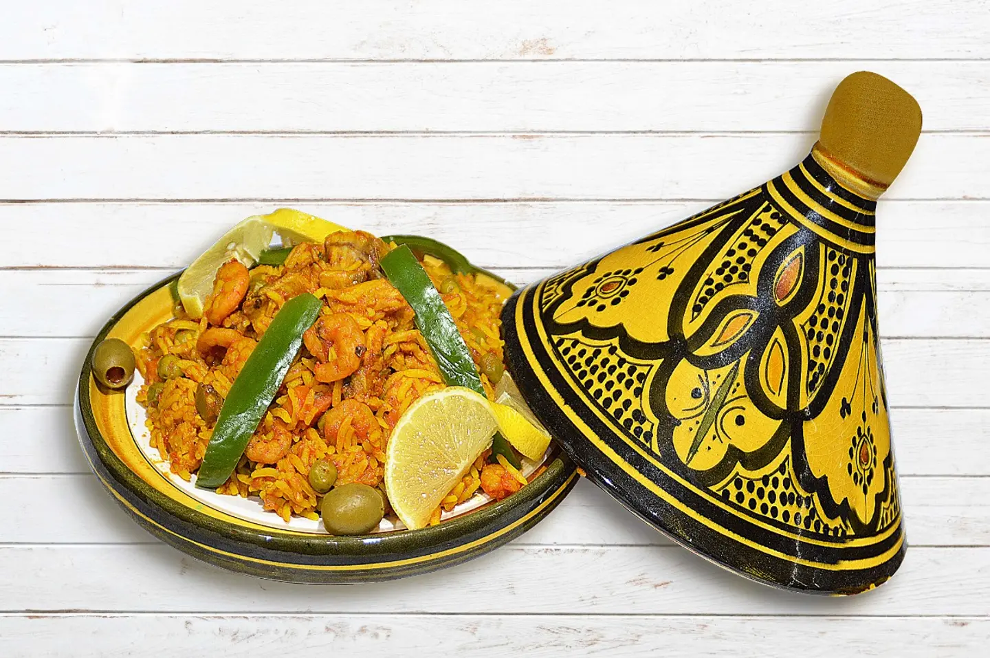 طاجن بايلا سمك هامور+جمبري+حبار مع رز