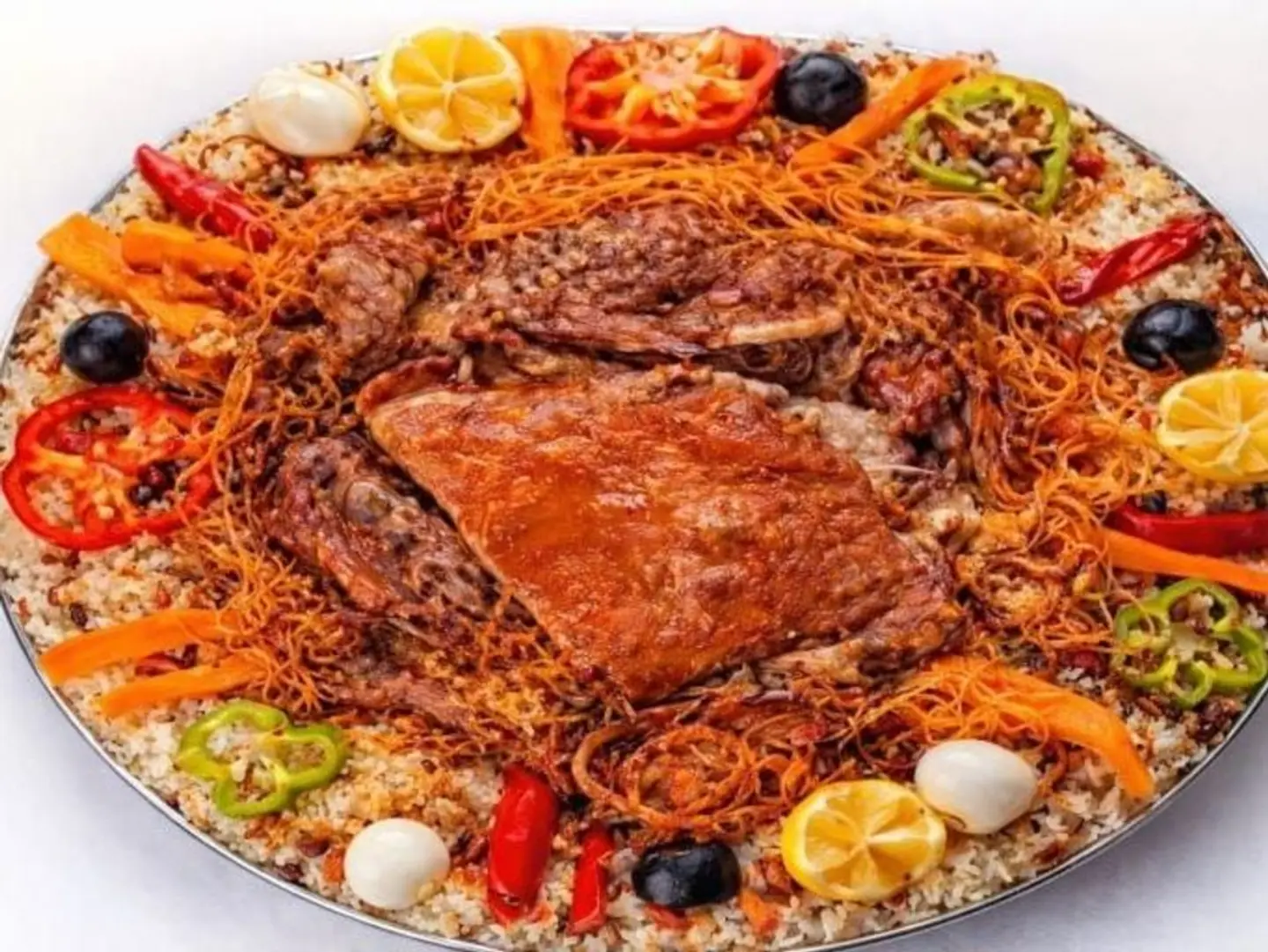 نصف تيس حنيذ