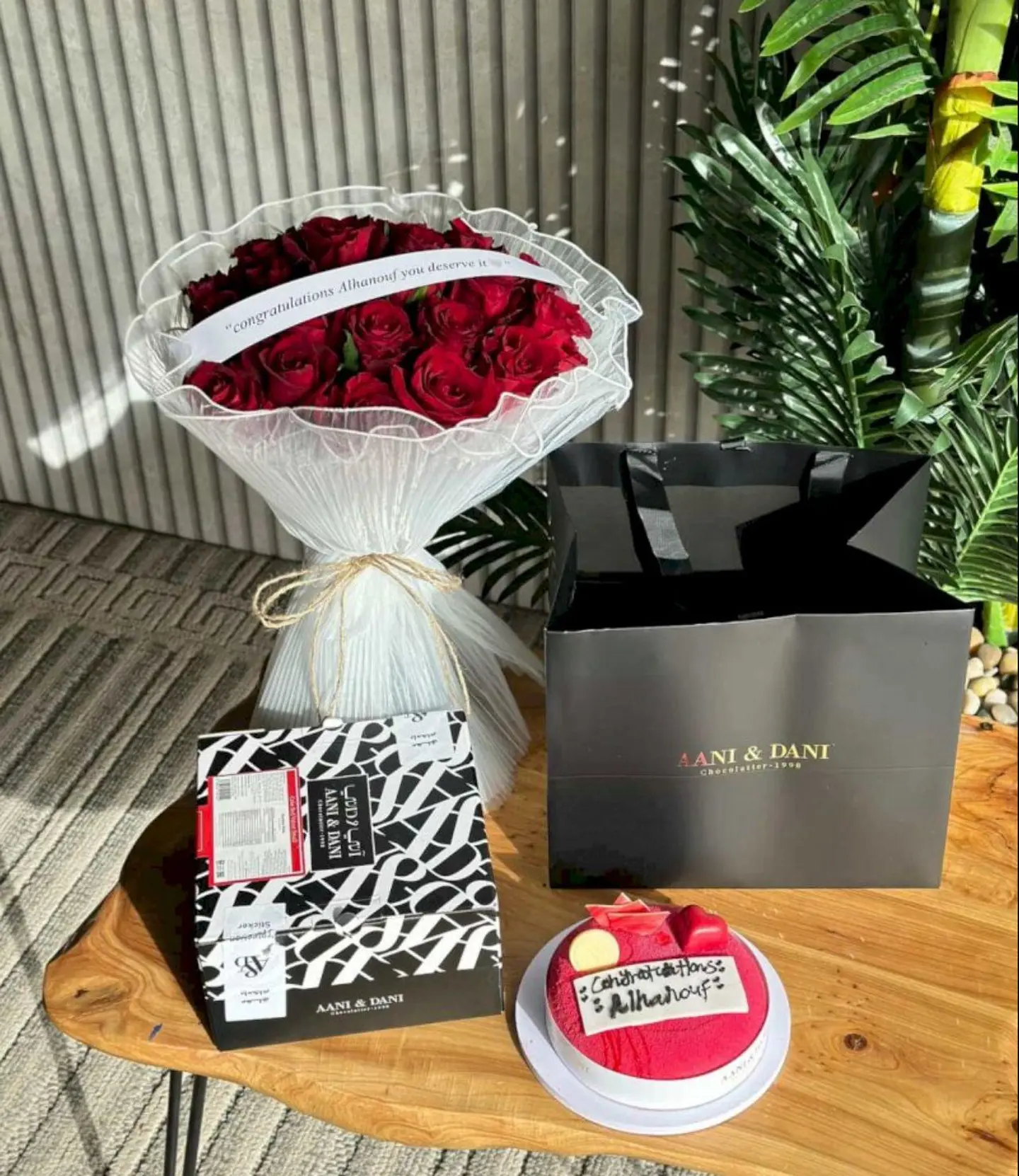 Red Flower Bouquet With Ani And Dani Cake