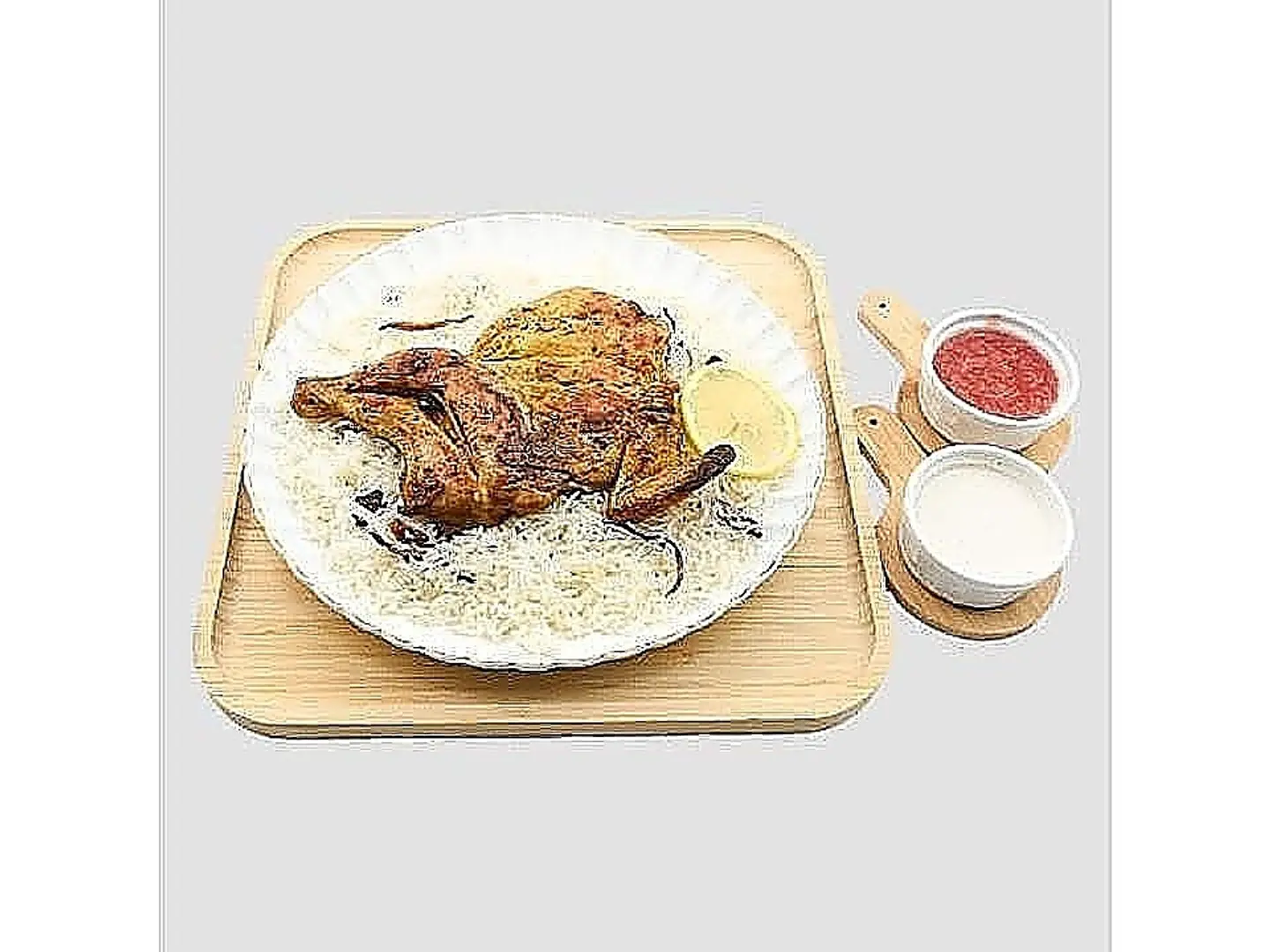 نصف حبة دجاج مظبي مع الأرز