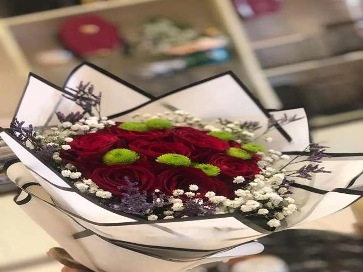 باقه زهور الحمراء