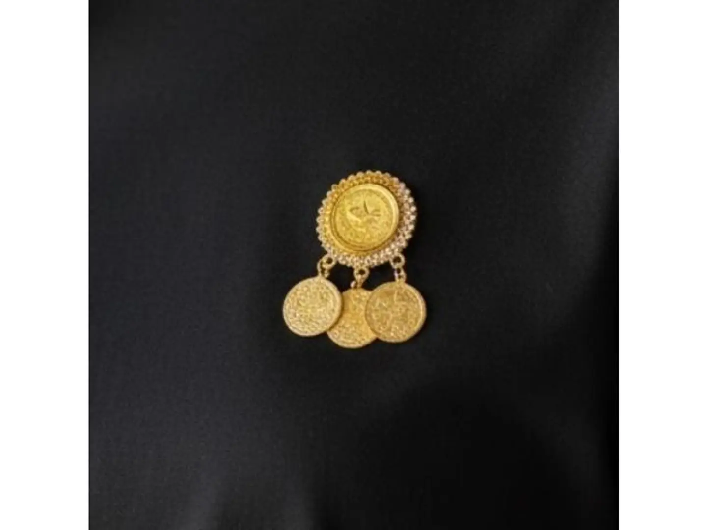 Gold Pound Brooch