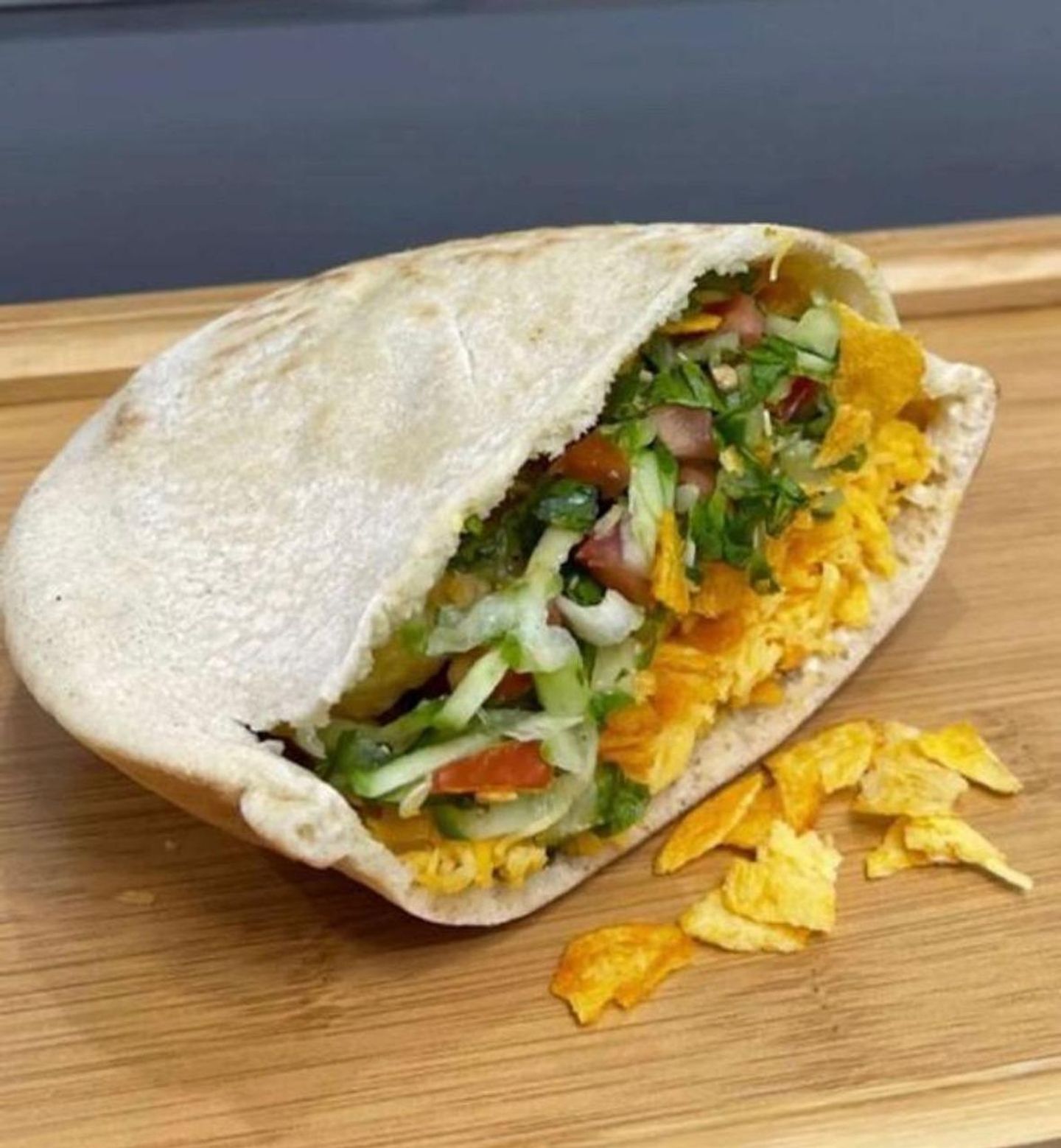 Falafel Sandwich With Egg, French Fries, Cheddar Cheese, And Spicy Batal Chips