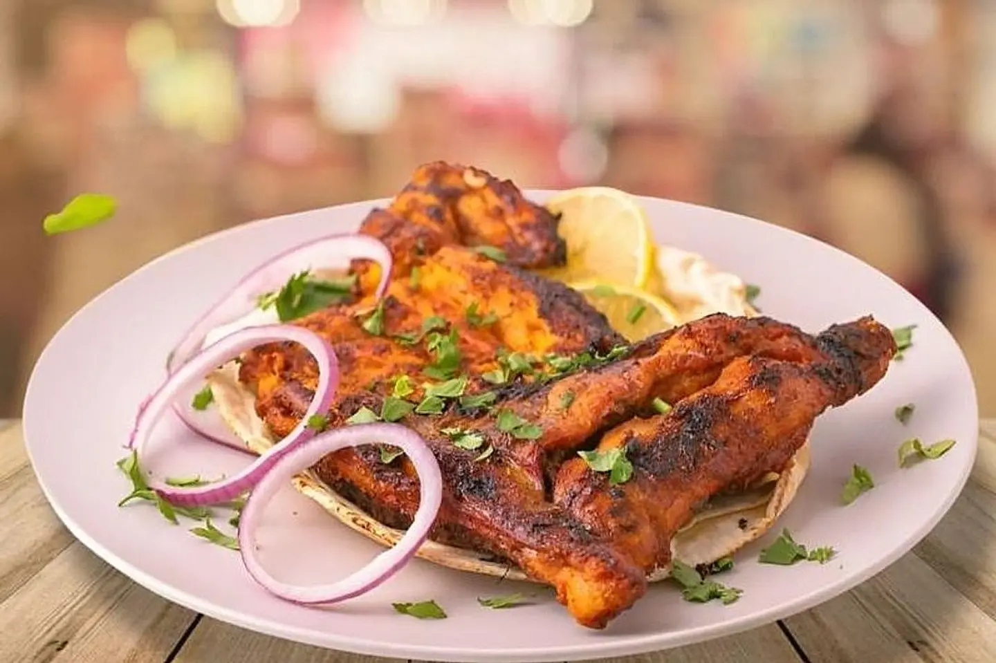 نصف على الفحم مع رز بخاري