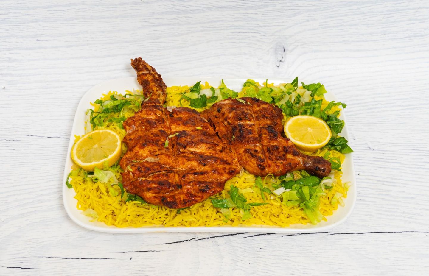 نص دجاج على الفحم مع الأرز
