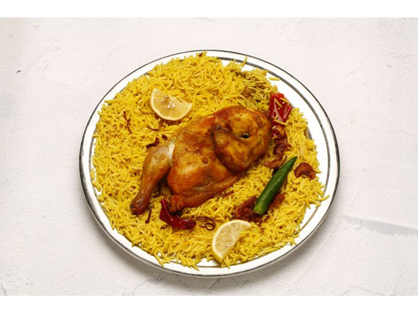 نصف دجاجة حنيذ