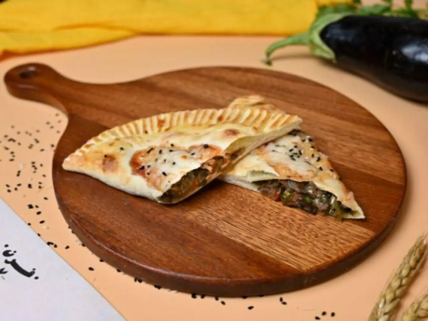 كالزوني حمسه الباذنجان