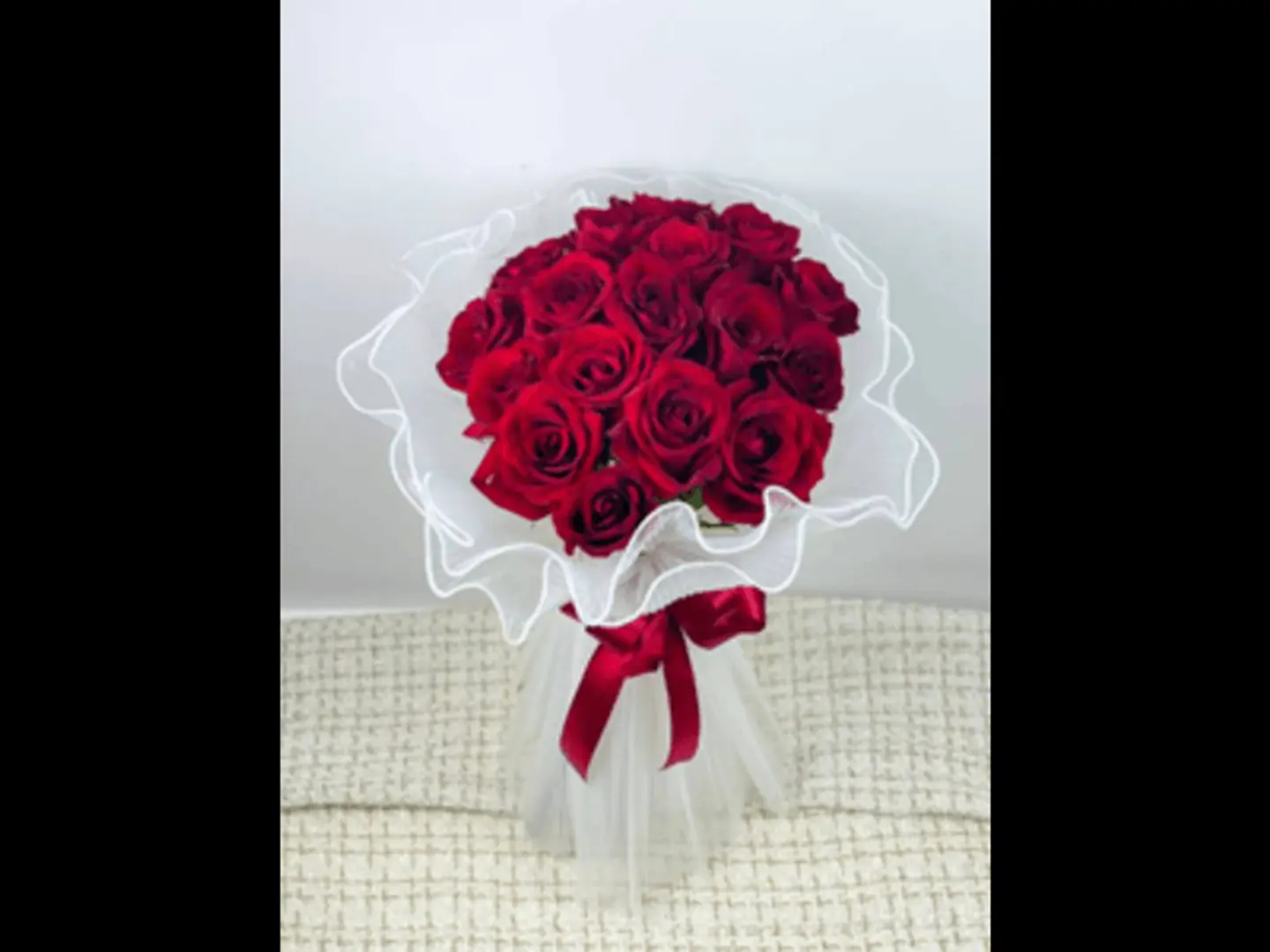 Red Bouquet With White Lace Fabric