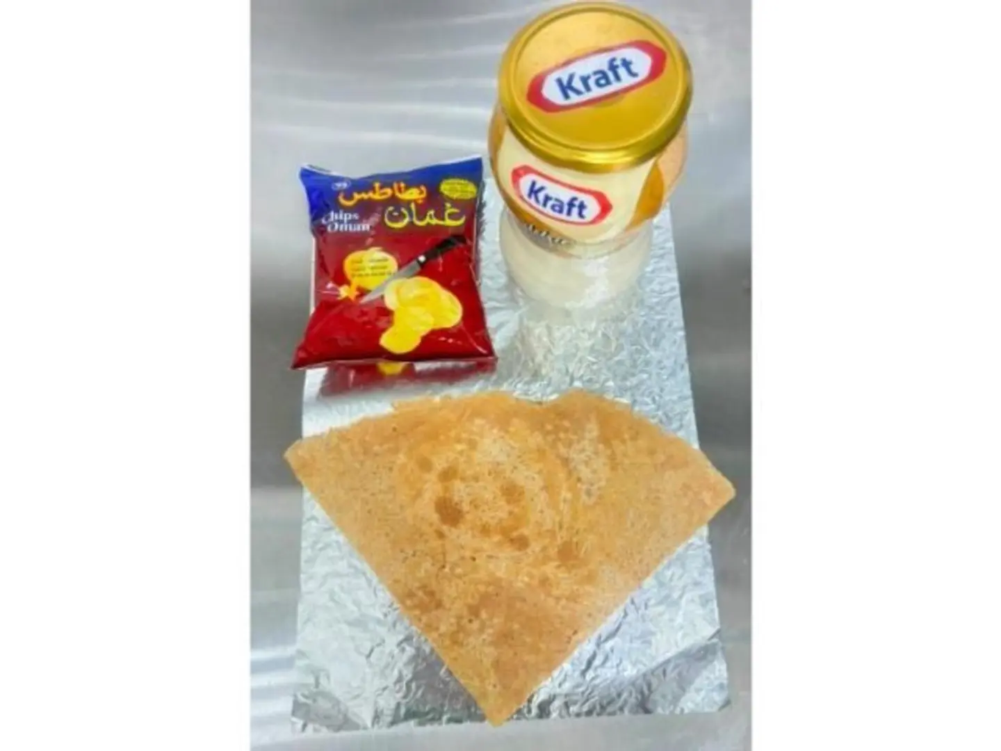 Rgag Bread With Cheese, Egg And Oman Chips