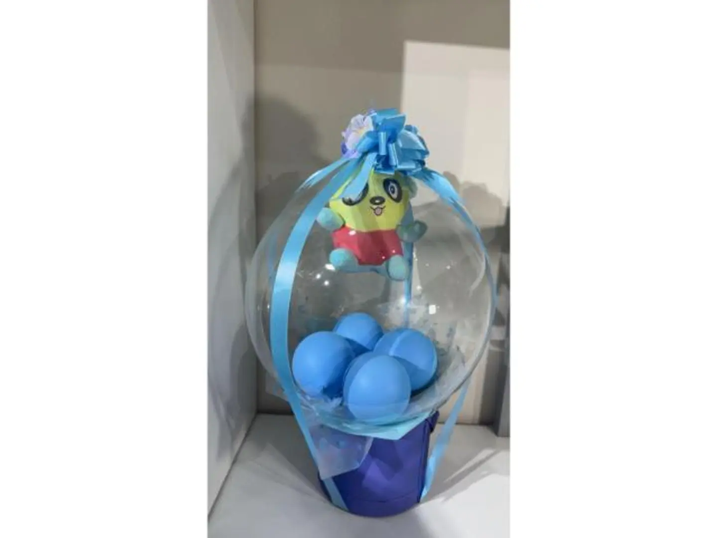 A Balloon And A Teddy Bear Gift