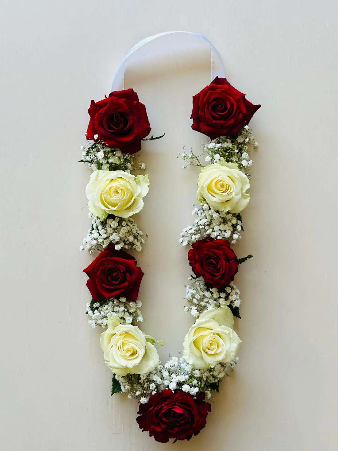 A Bouquet Of Red And White Roses.