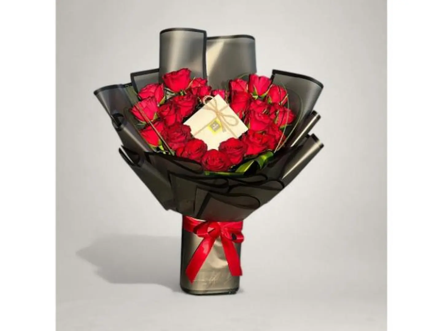 A Bouquet Of Roses With Patchi