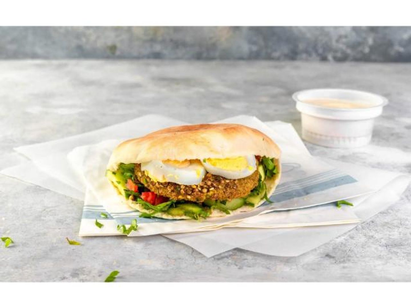 Falafel Sandwich With Eggs And Hummus