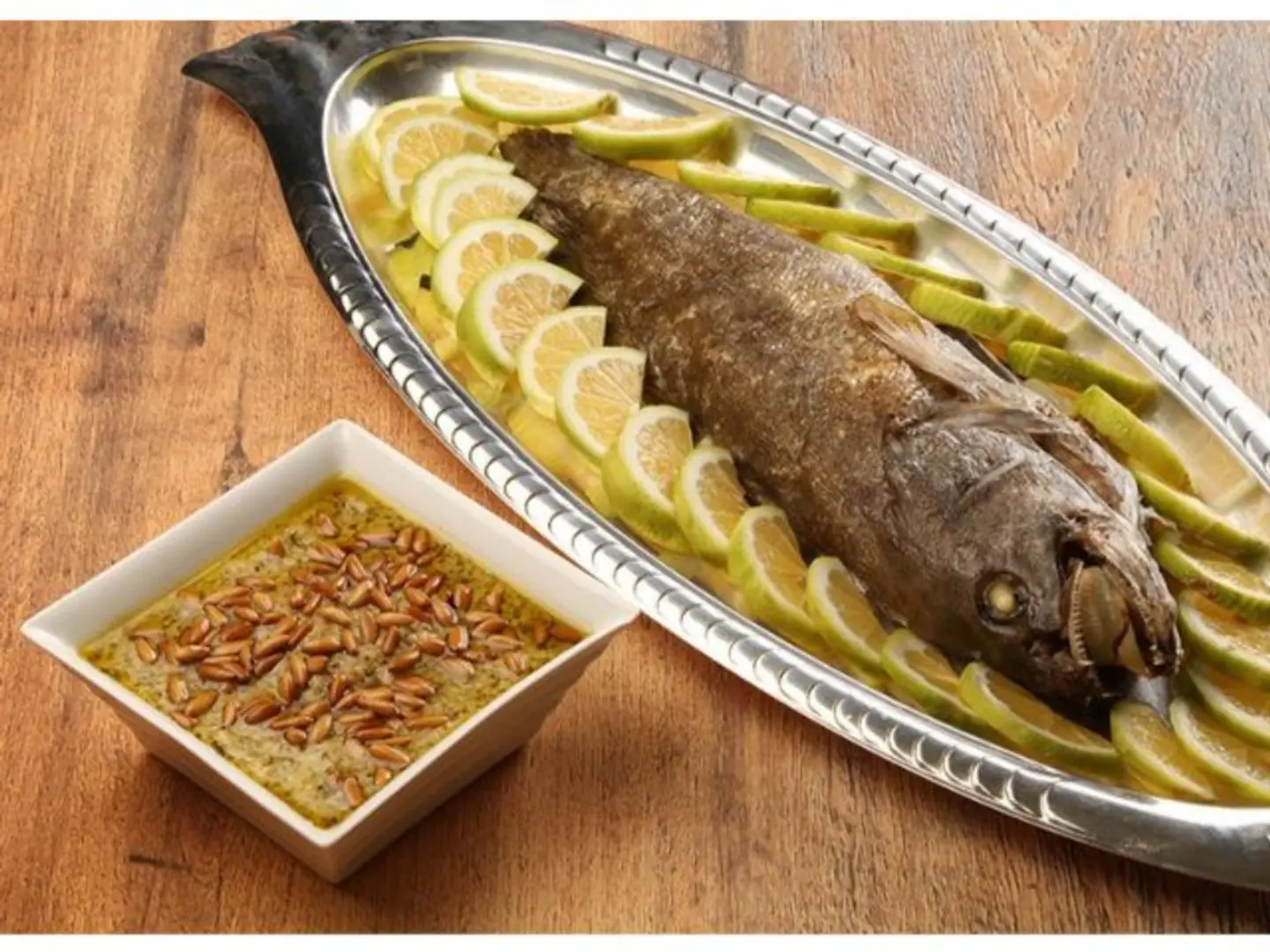 سمك بصلصةالثوم الحارة