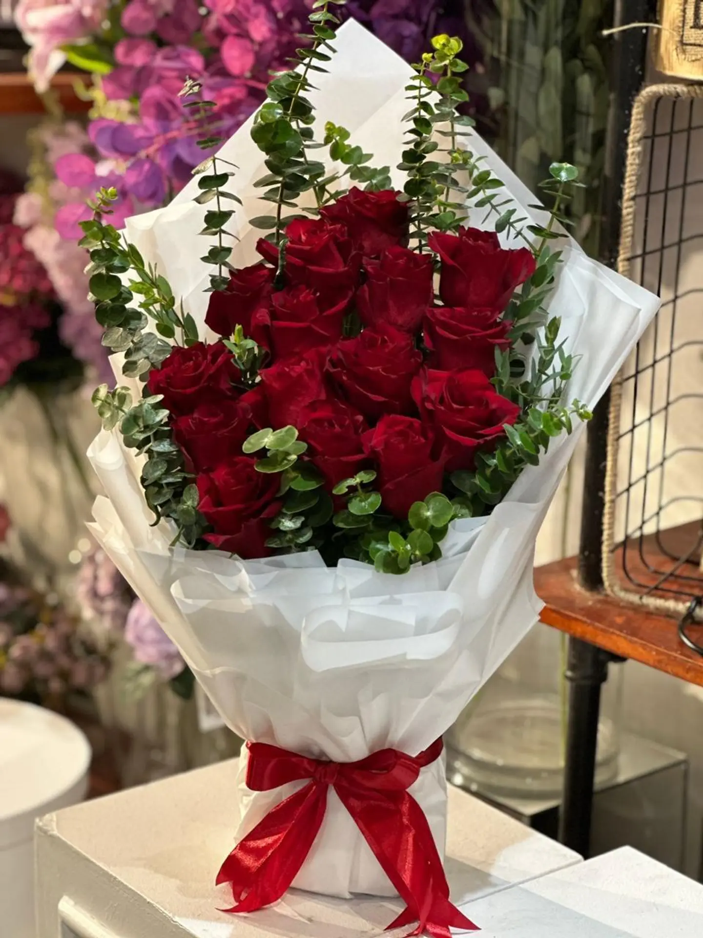 A Beautiful Red Roses With Cluptos
