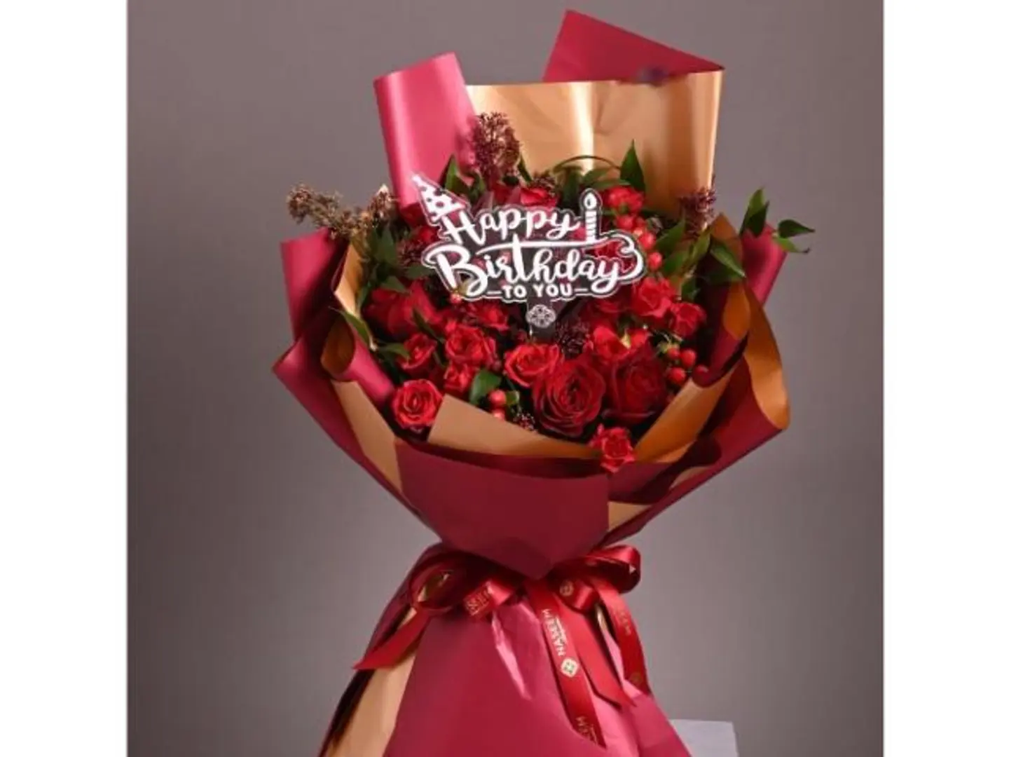 A Bouquet Of Warm Roses With A Birthday Greeting