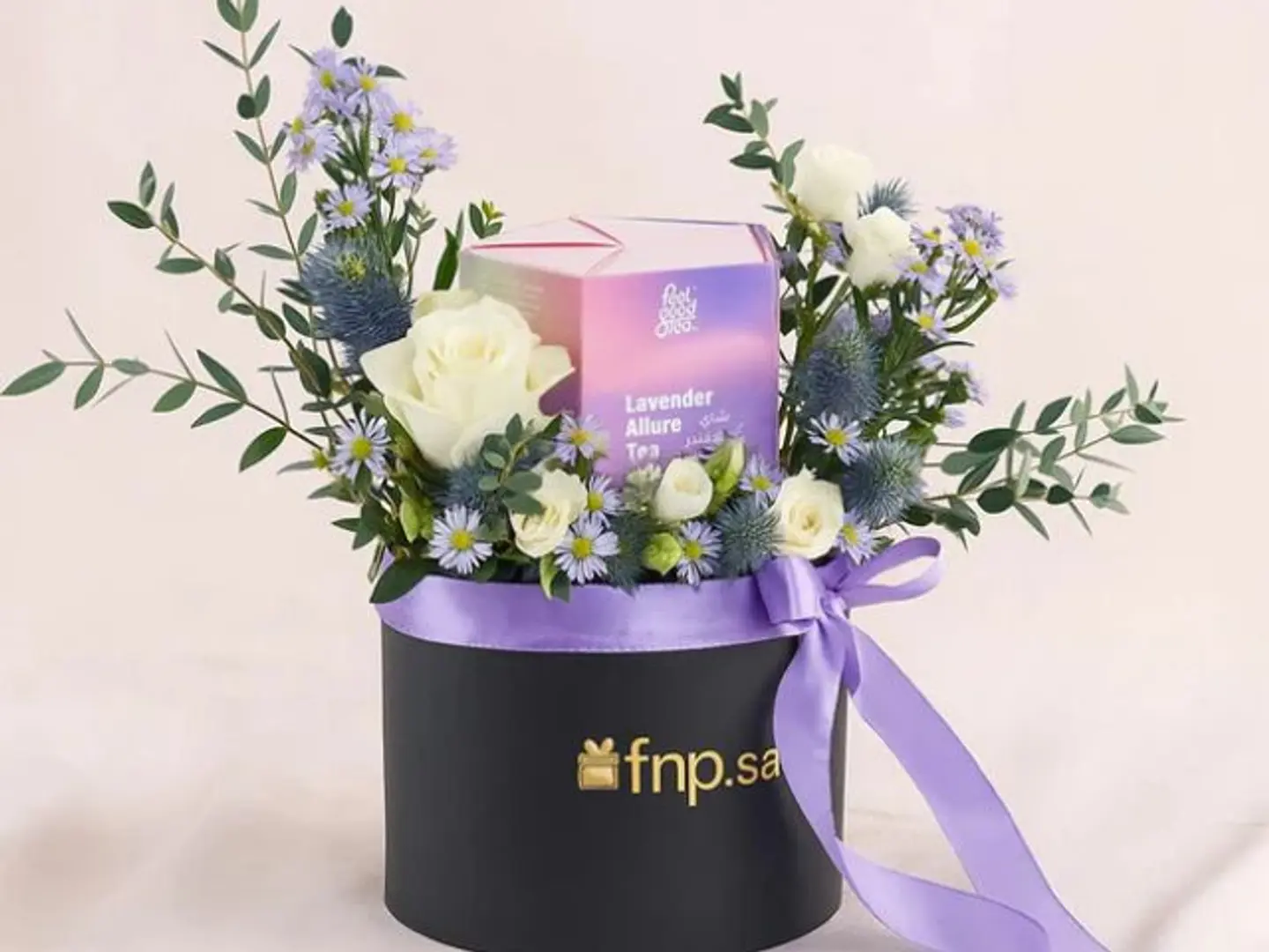 A Box Of Roses With A Box Of Feel Good Tea Lavender.