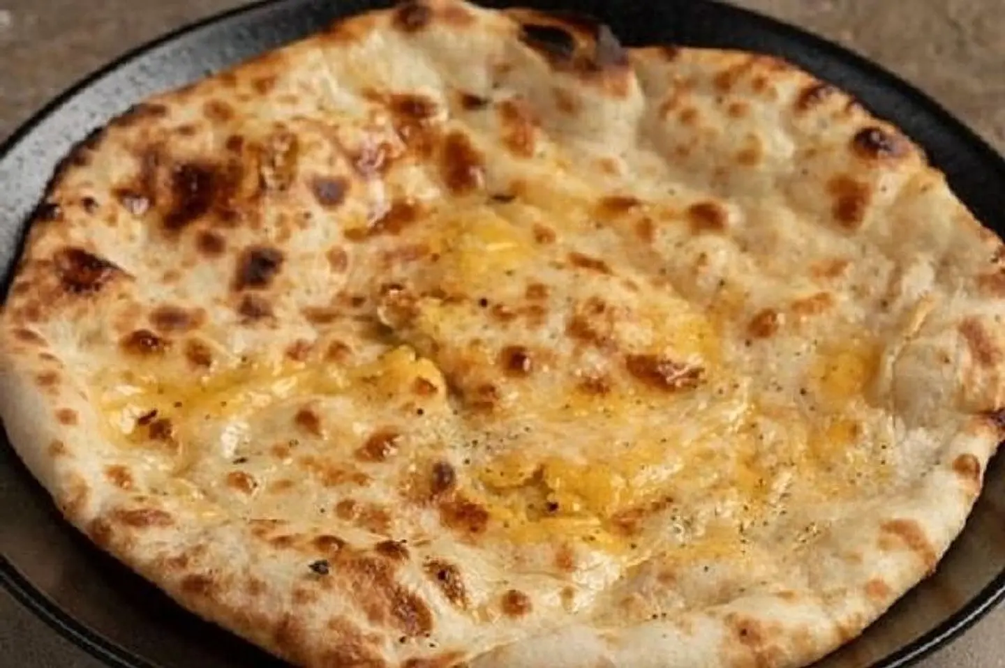 Cheese Naan ( Plain Or Masala )