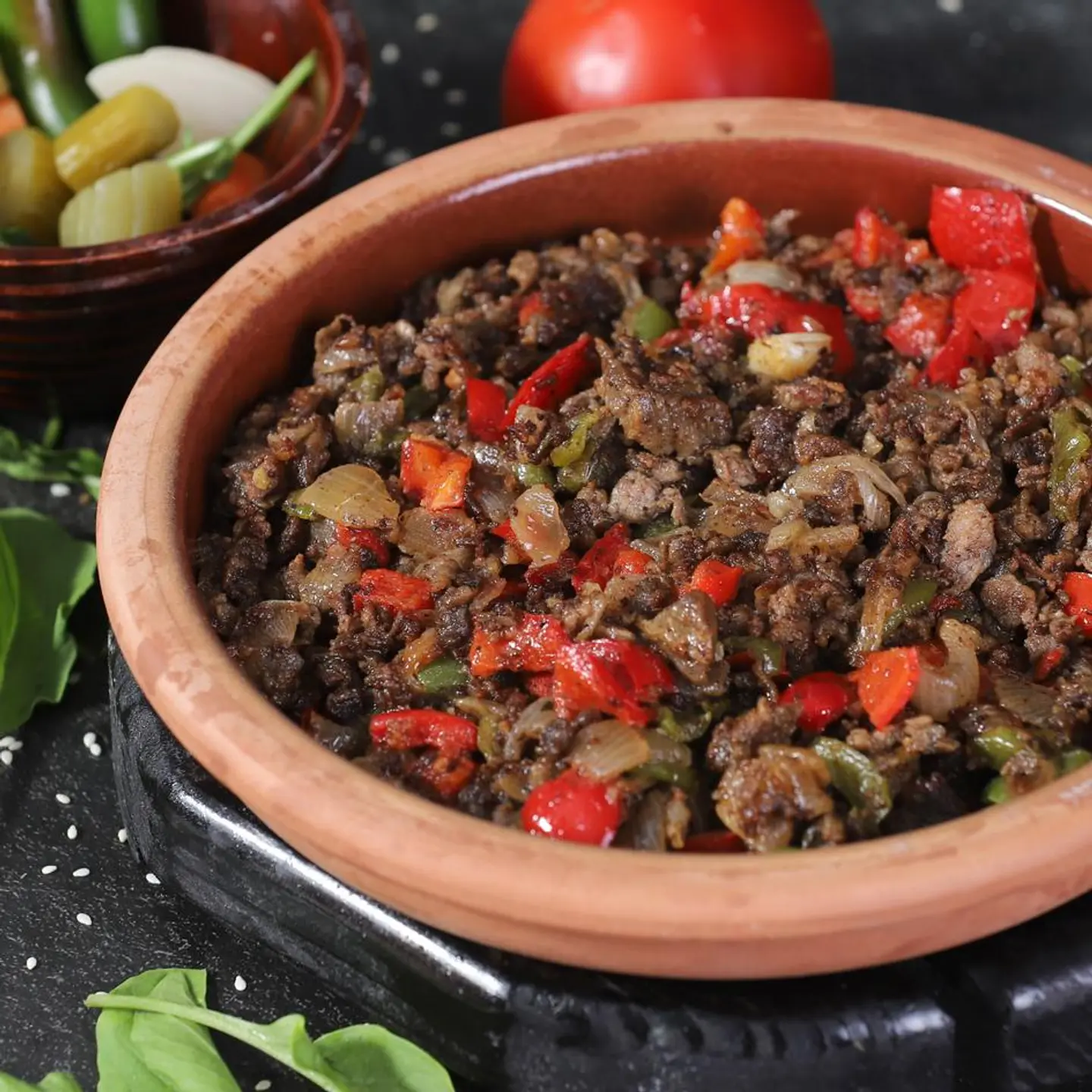 Meat With Tomato On A Plate