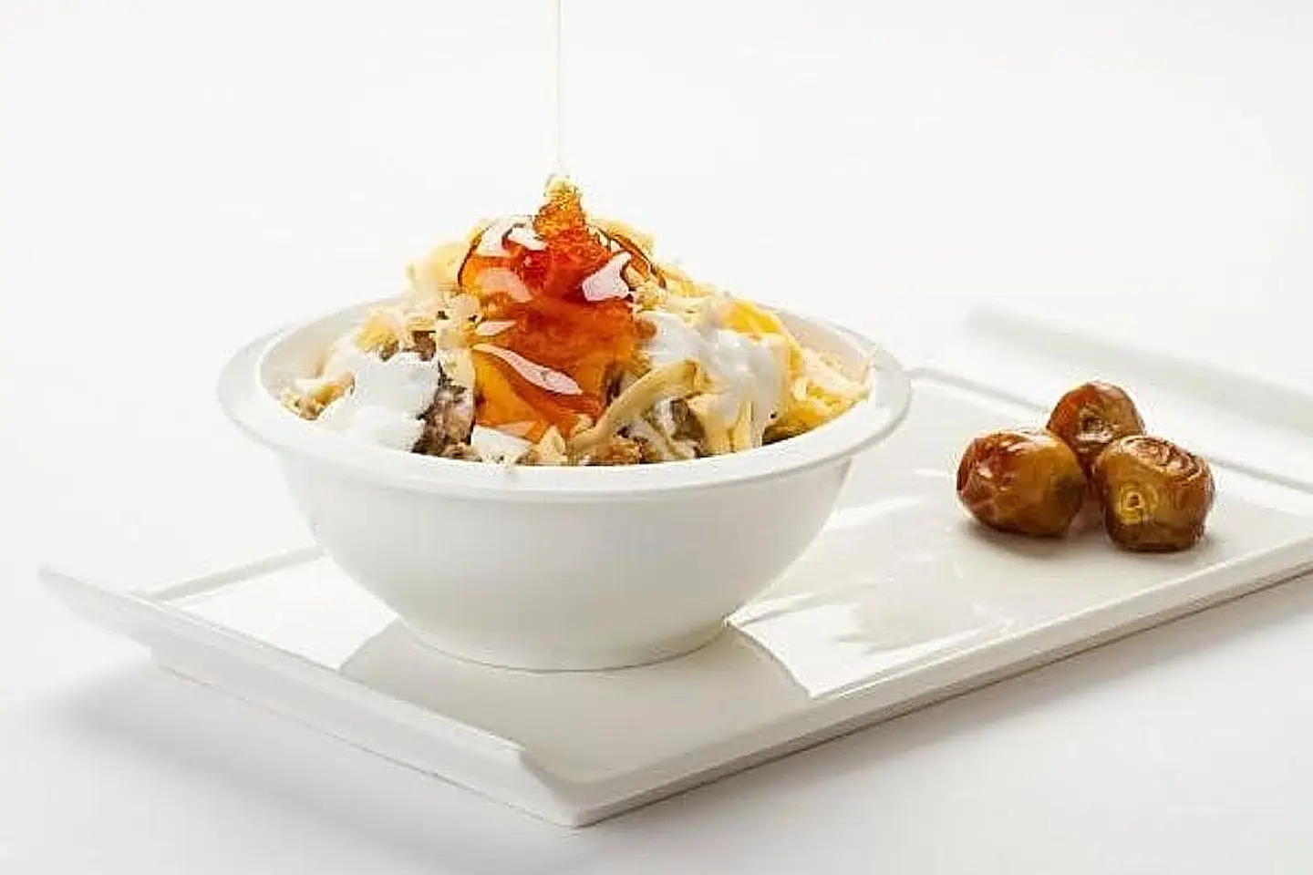 Mixed Millet Areekah , Dates, Cream, Honey And Local Ghee