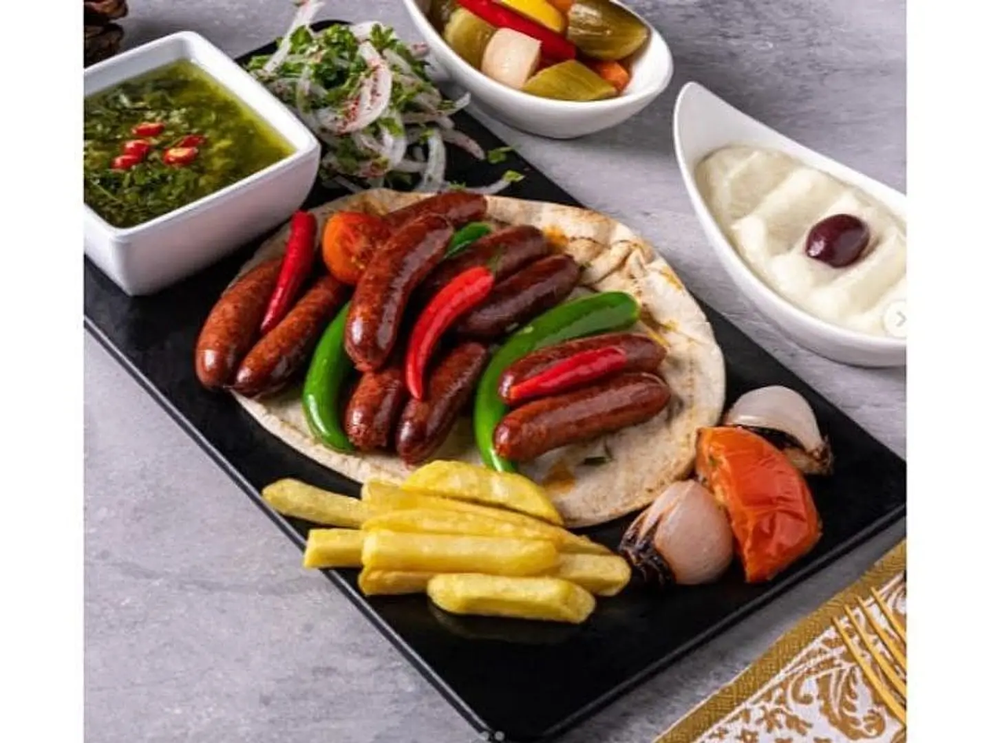 ربع كغ سجق على فحم