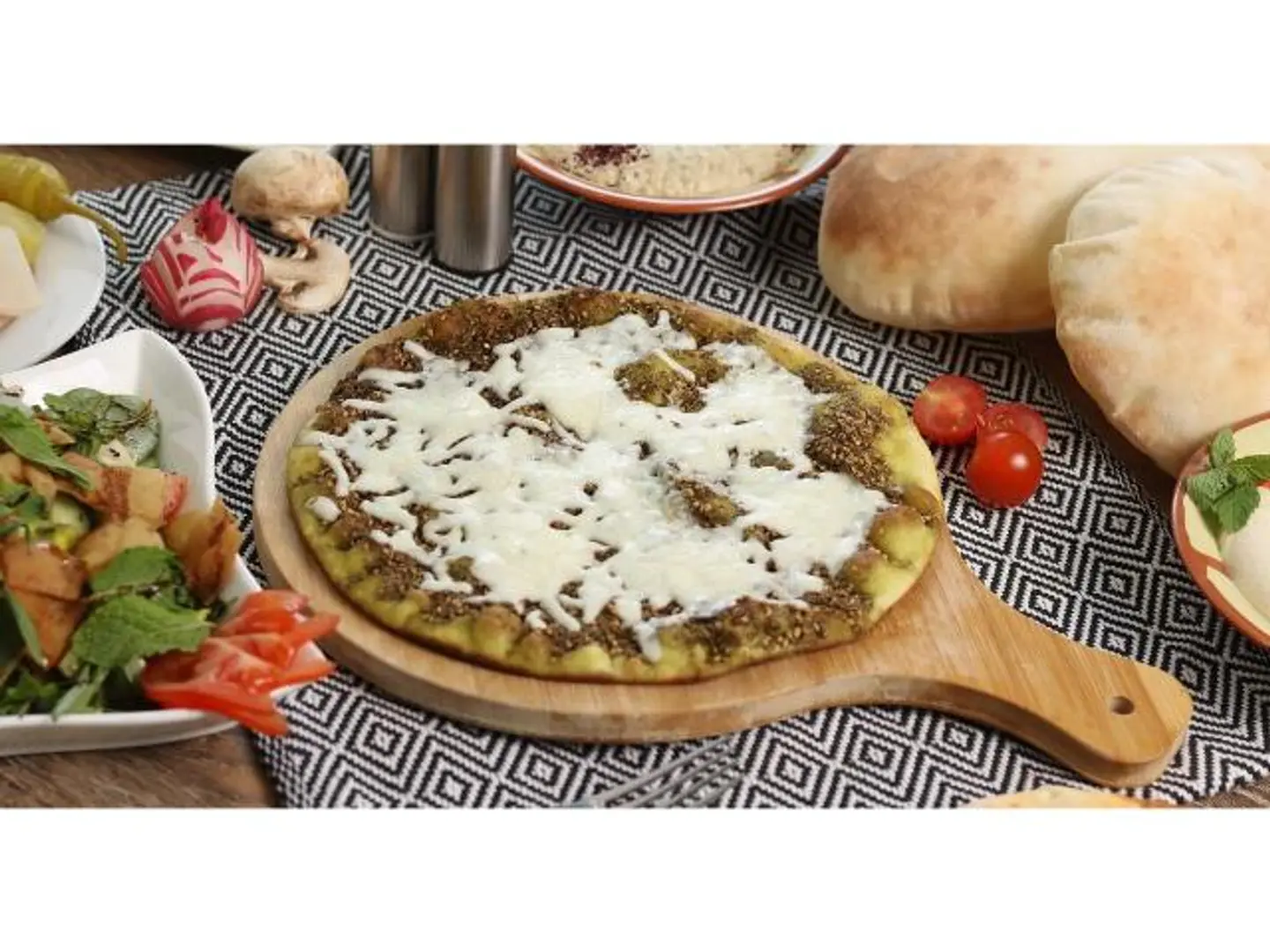 Zaatar And Mozzarella Cheese Mankousheh