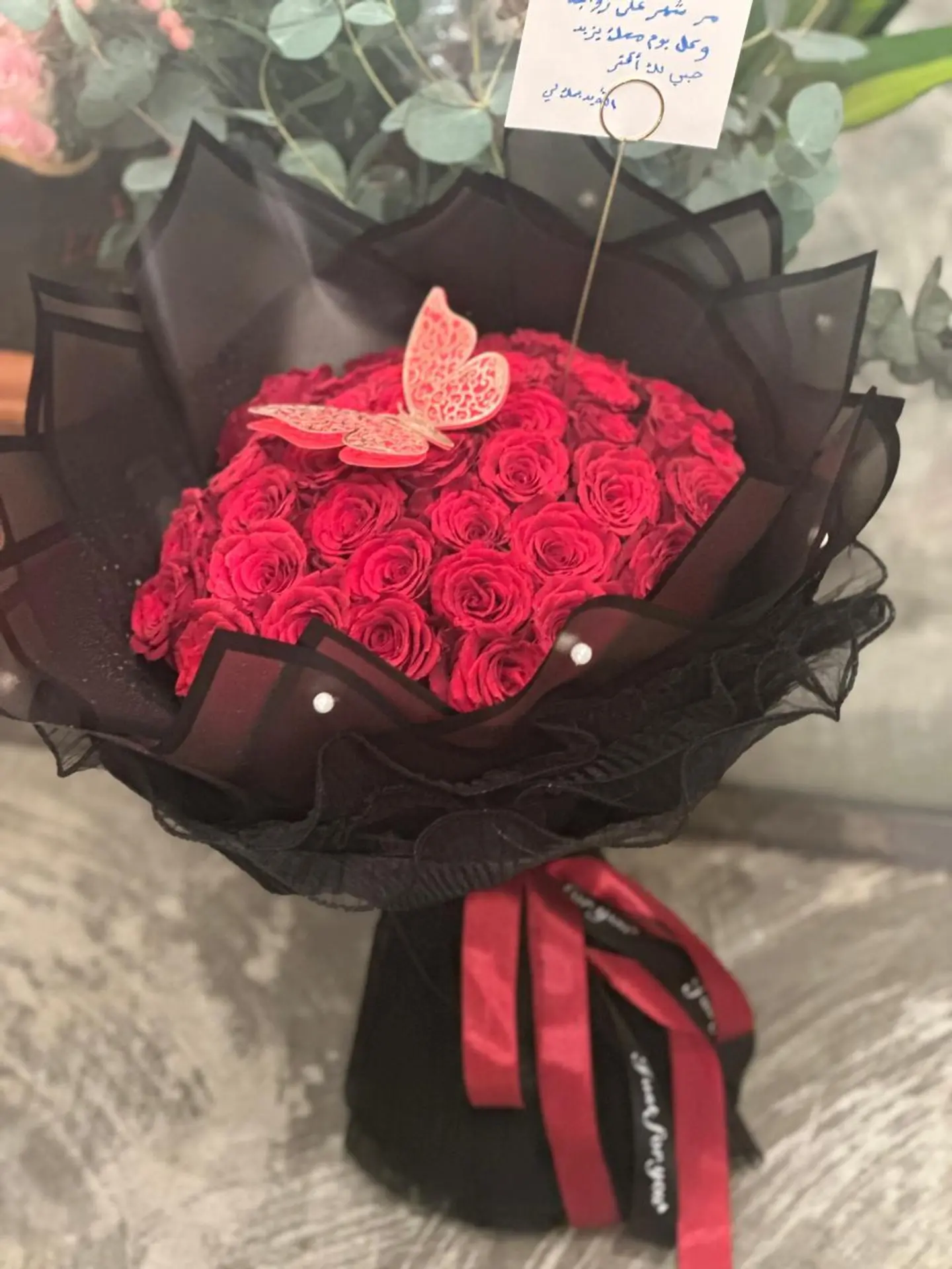 بوكيه الفراشه الحمراء