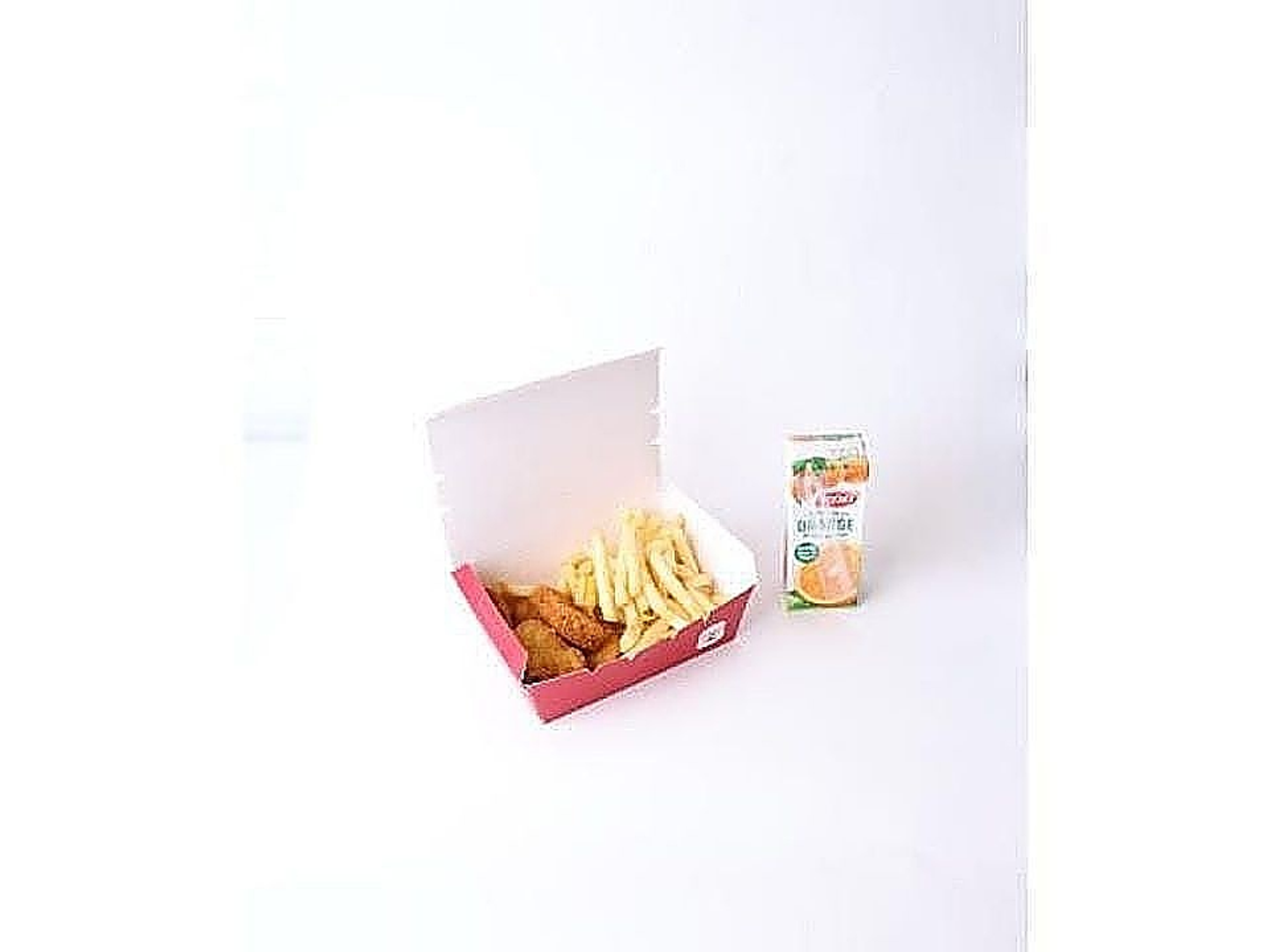 Chicken Nuggets And Fries And Juice