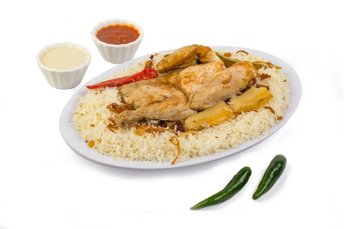 نصف دجاج مدفون رز شعبي