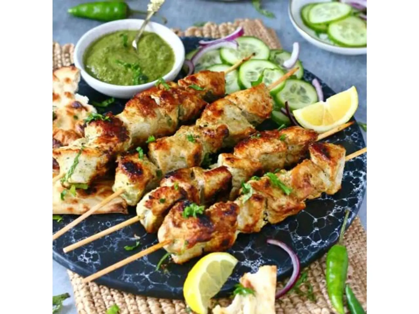 Malai Tikka 8 Pieces Of Chicken Marinated In Cream And Grilled