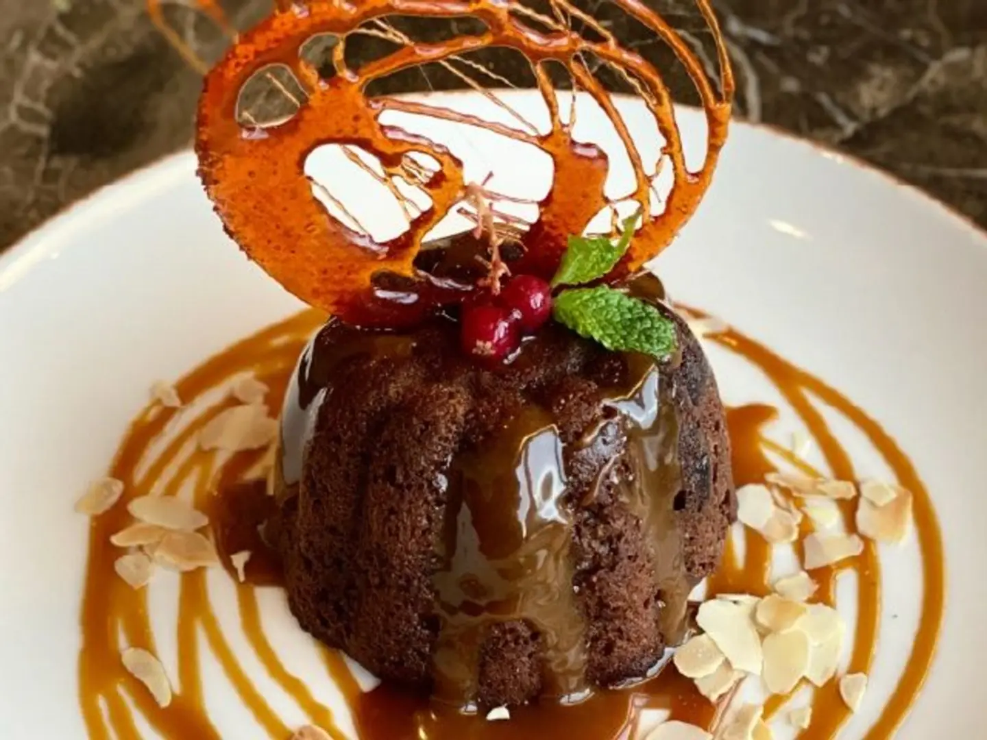 Sticky Date Pudding Topped With Caramel Sauce