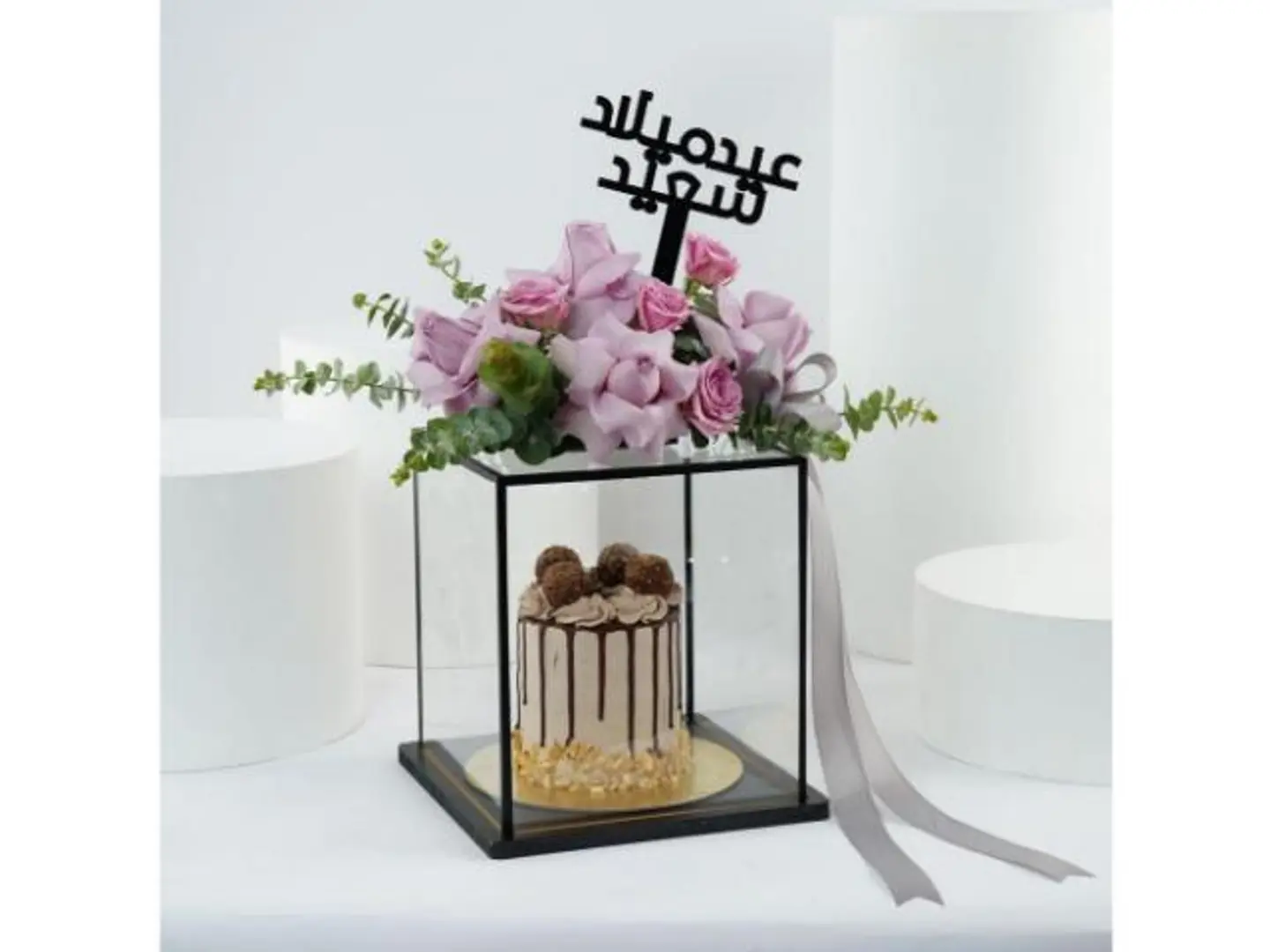 A Purple Rose Stand With Cake