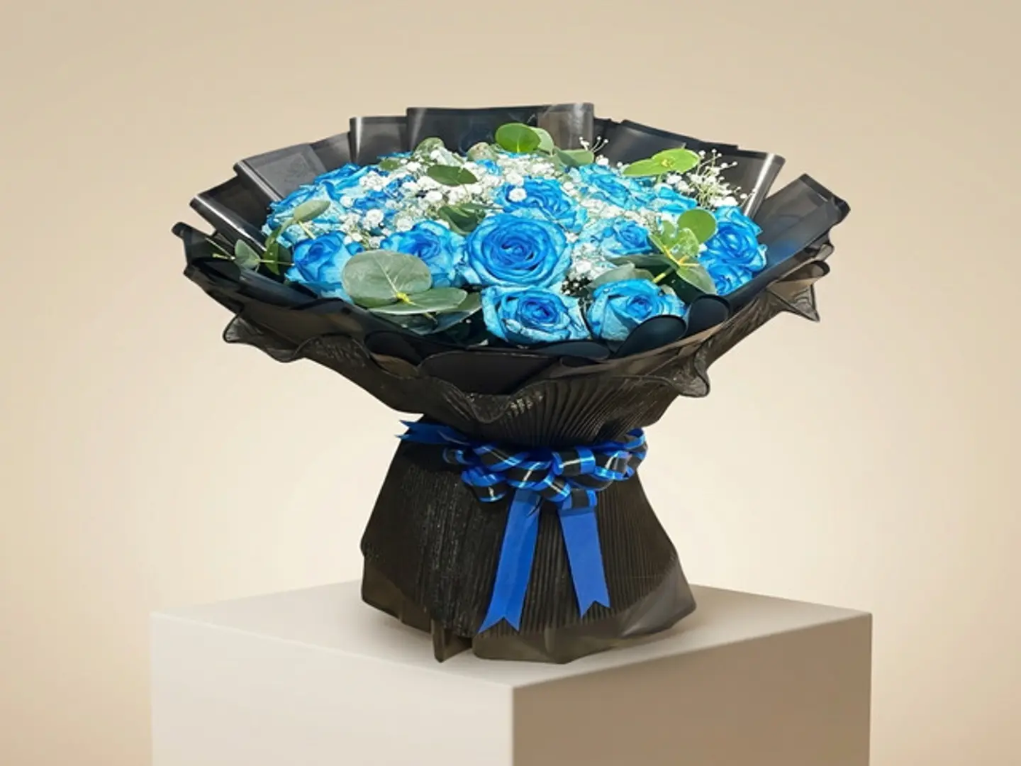 Royal Blue Rose Bouquet Wrapped In Luxurious Black Paper