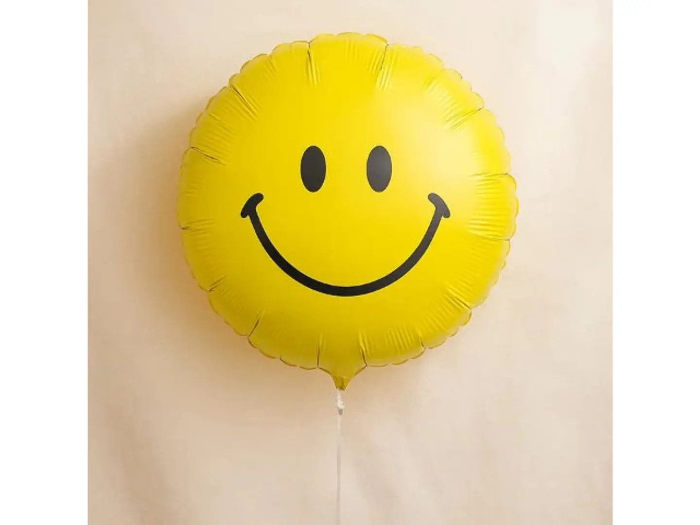 بالون وجه مبتسم