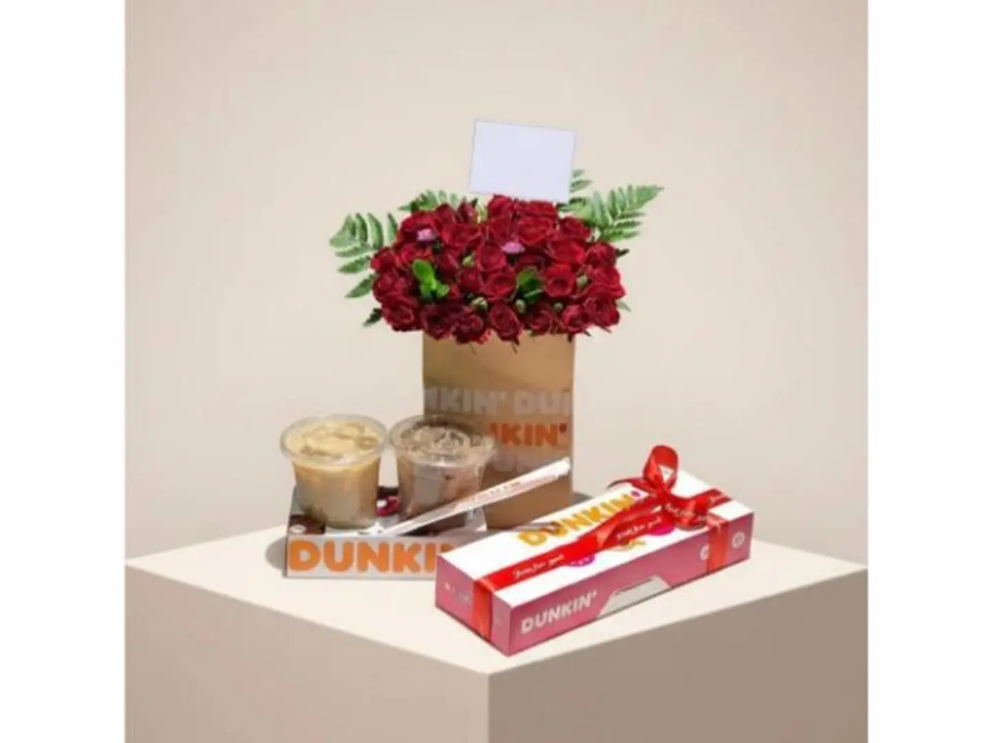 A Luxurious Arrangement Of Roses With Coffee